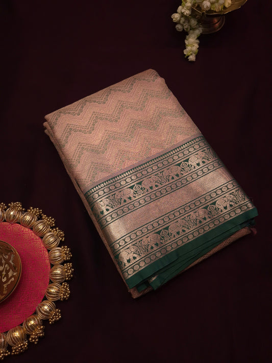 Light Pink Semi Silk Saree with Zig Zag Pattern and Bottle Green Golden Zari Border