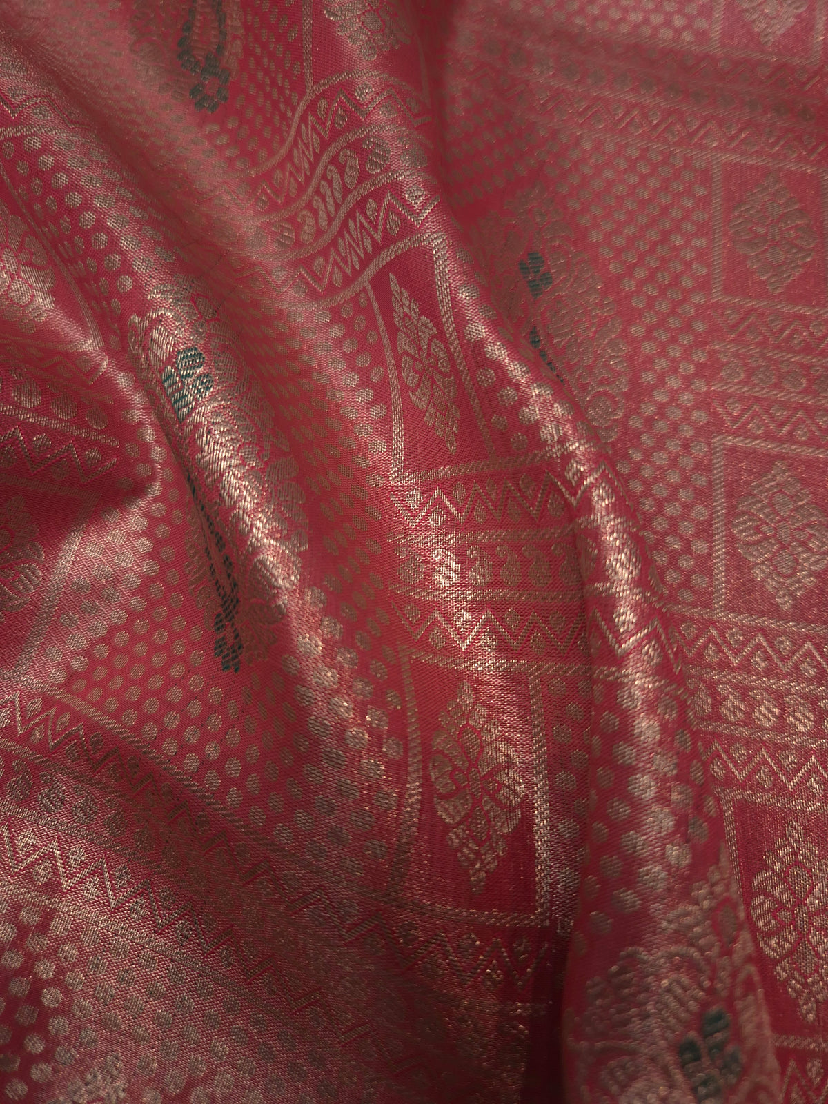Reddish Pink Colour with Overall Intricate Silver Zari Semi Silk Saree with Bottle Green Broad Silver Zari Border