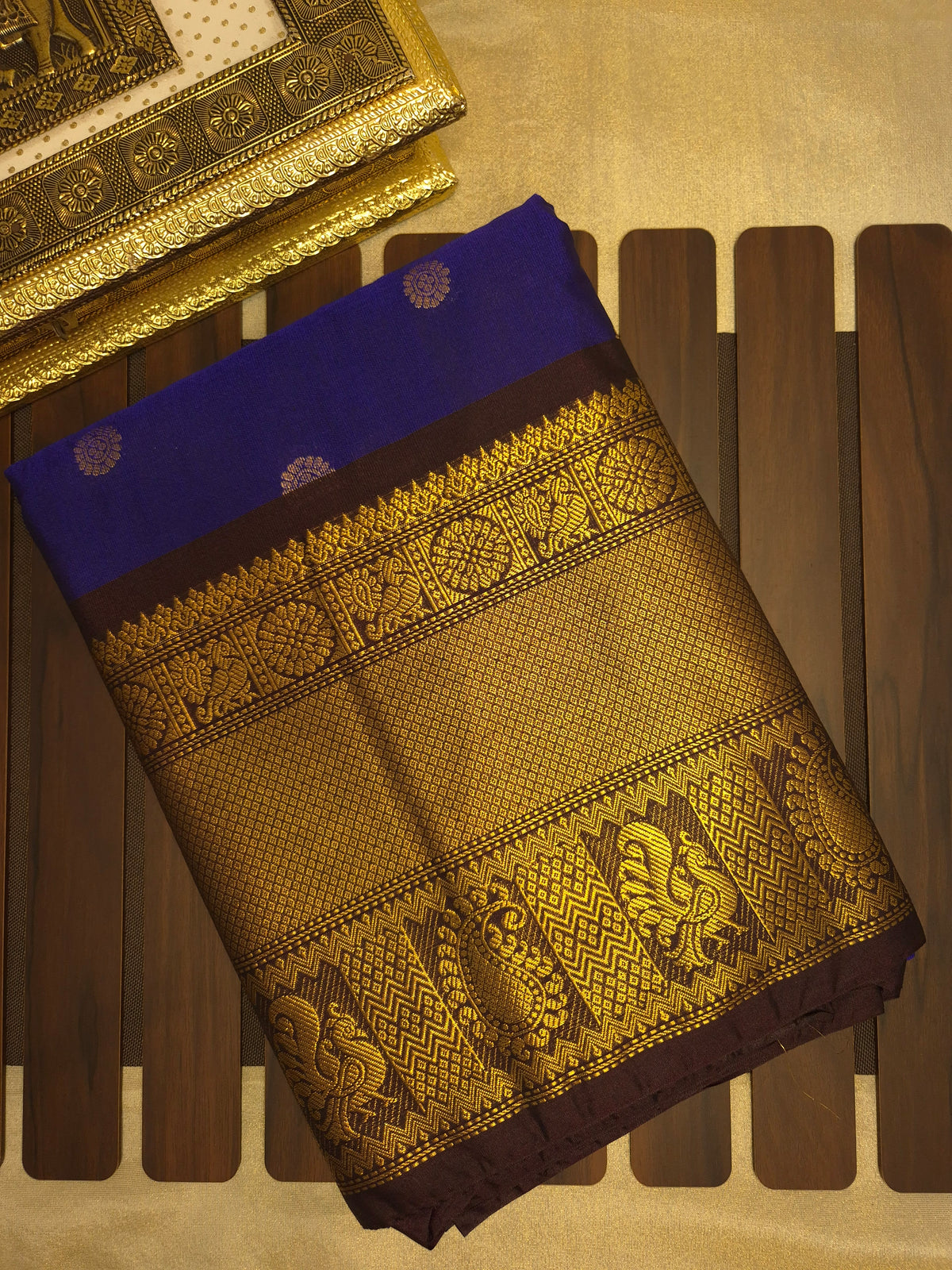 Royal Blue Gadwal Silk Saree with all-over Golden Buttas and Intricate Design on Dark Wine Border