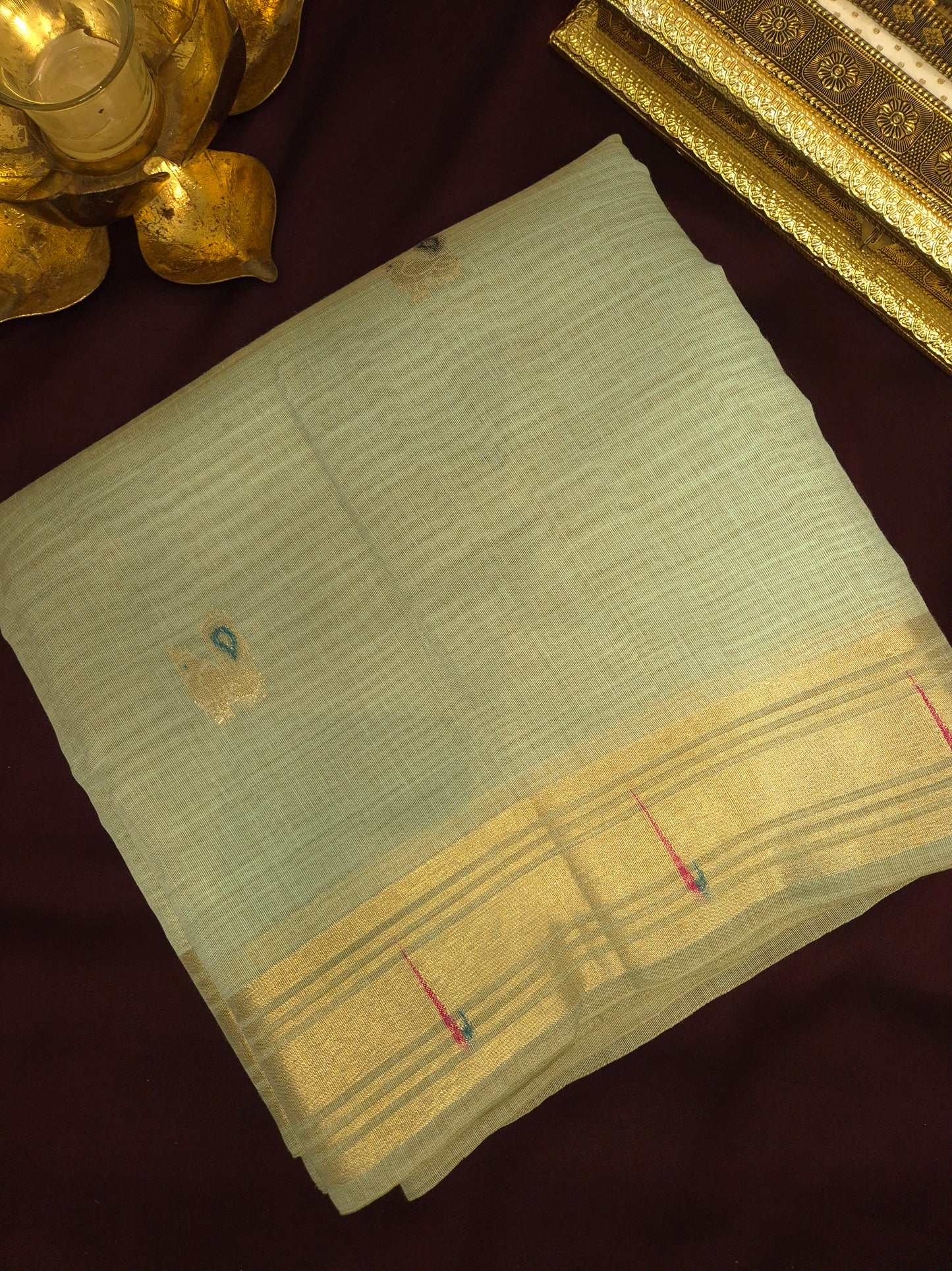 Light Blue Jamdani Saree with Golden Zari Peacock Buttas and Colorful Peacock Motifs on Pallu