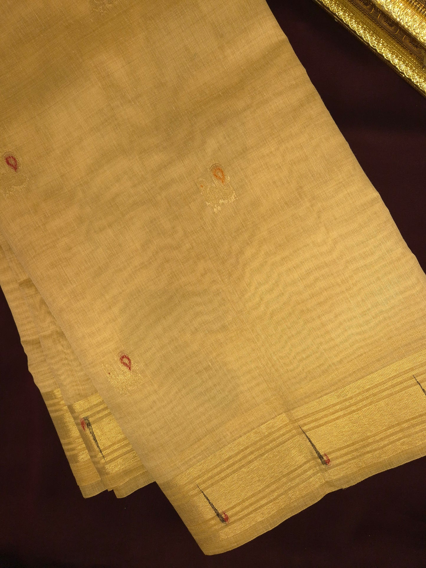 Beige Jamdani Saree with Golden Zari Peacock Buttas and Colorful Peacock Motifs on Pallu