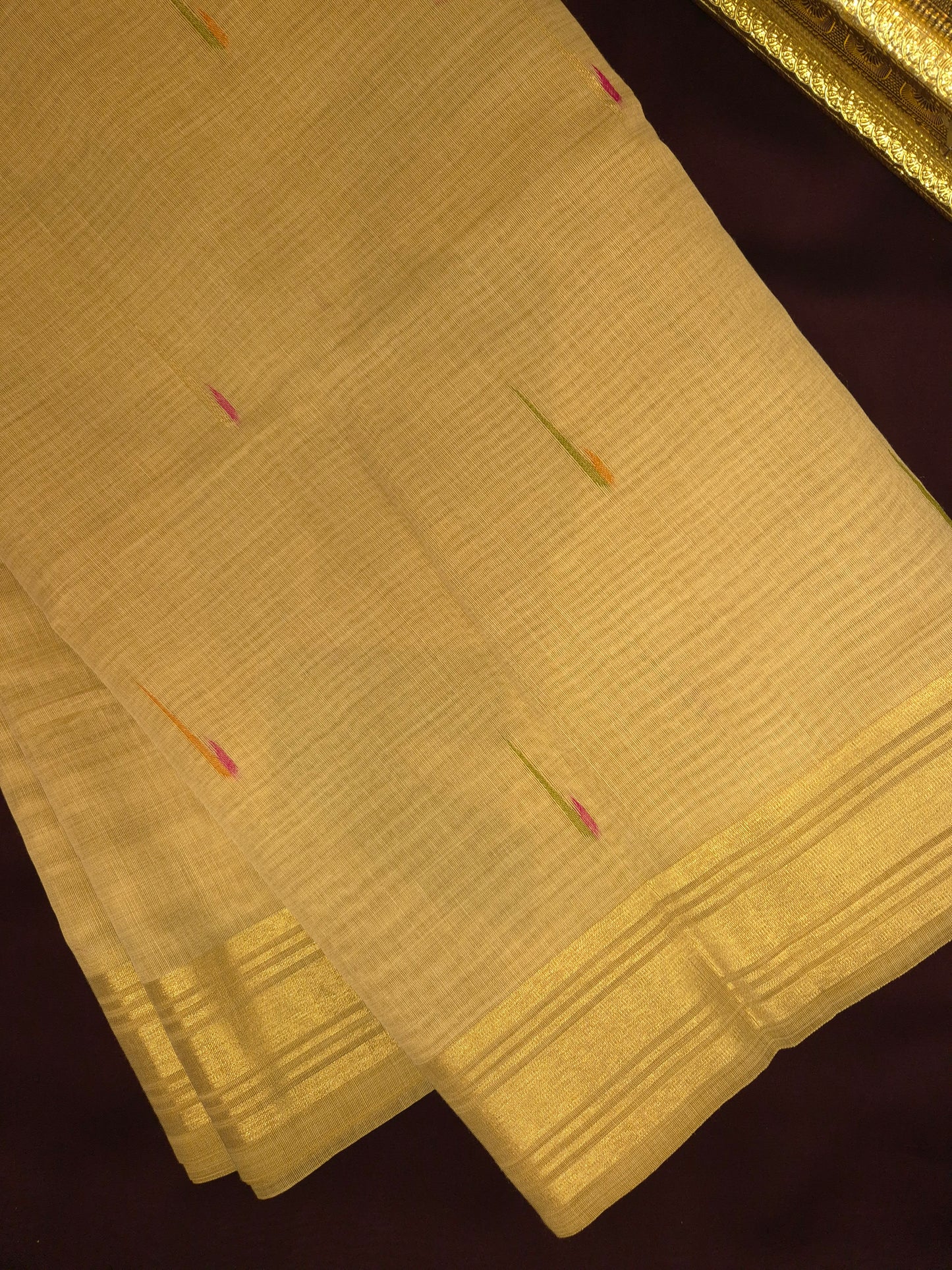 Beige Jamdani Saree with Colourful Buttas with Golden Zari and Colorful Floral Motifs on Pallu