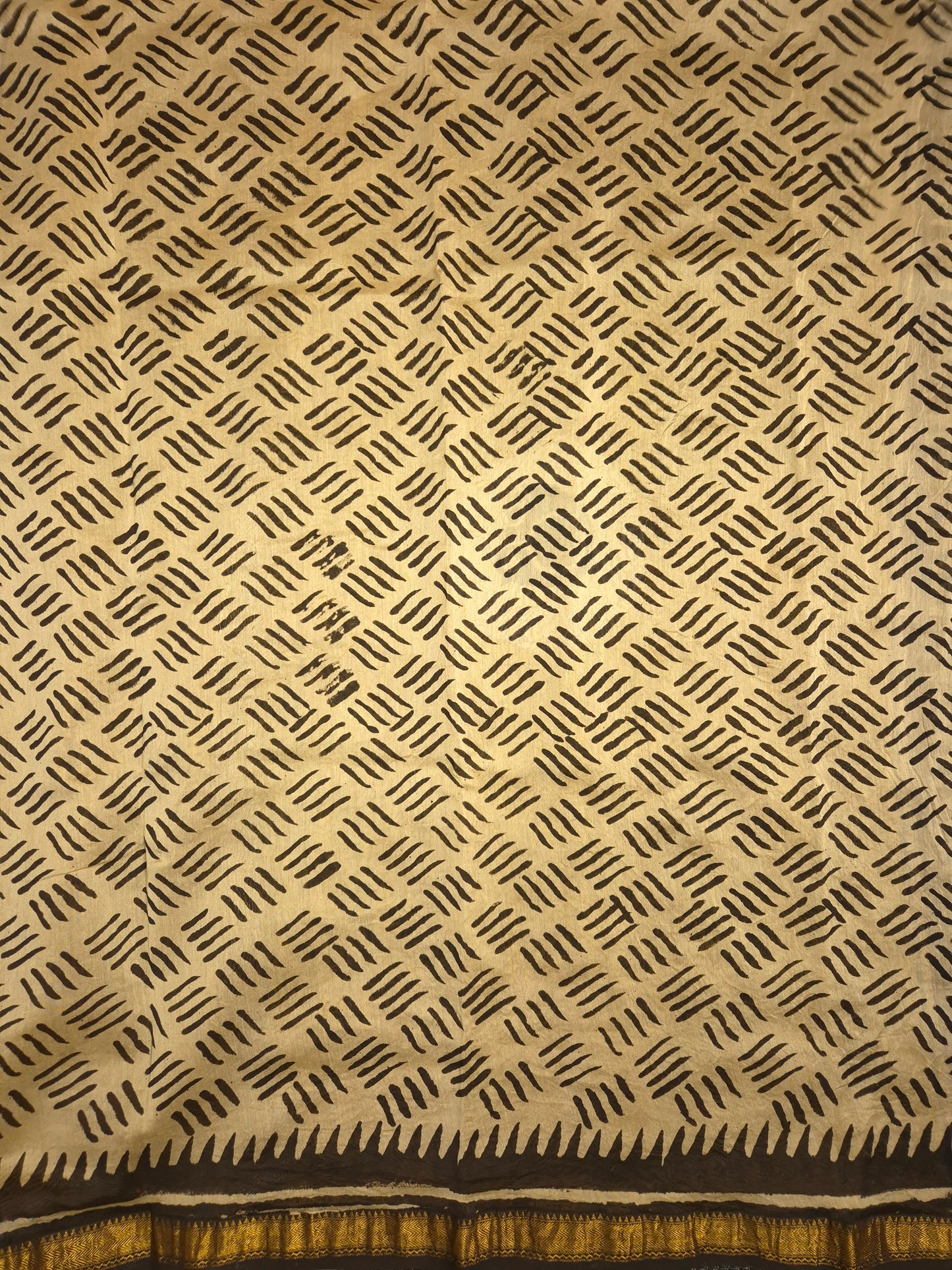 Ajrakh Printed Silk Saree with striped pattern and small intricate temple golden Zari Border