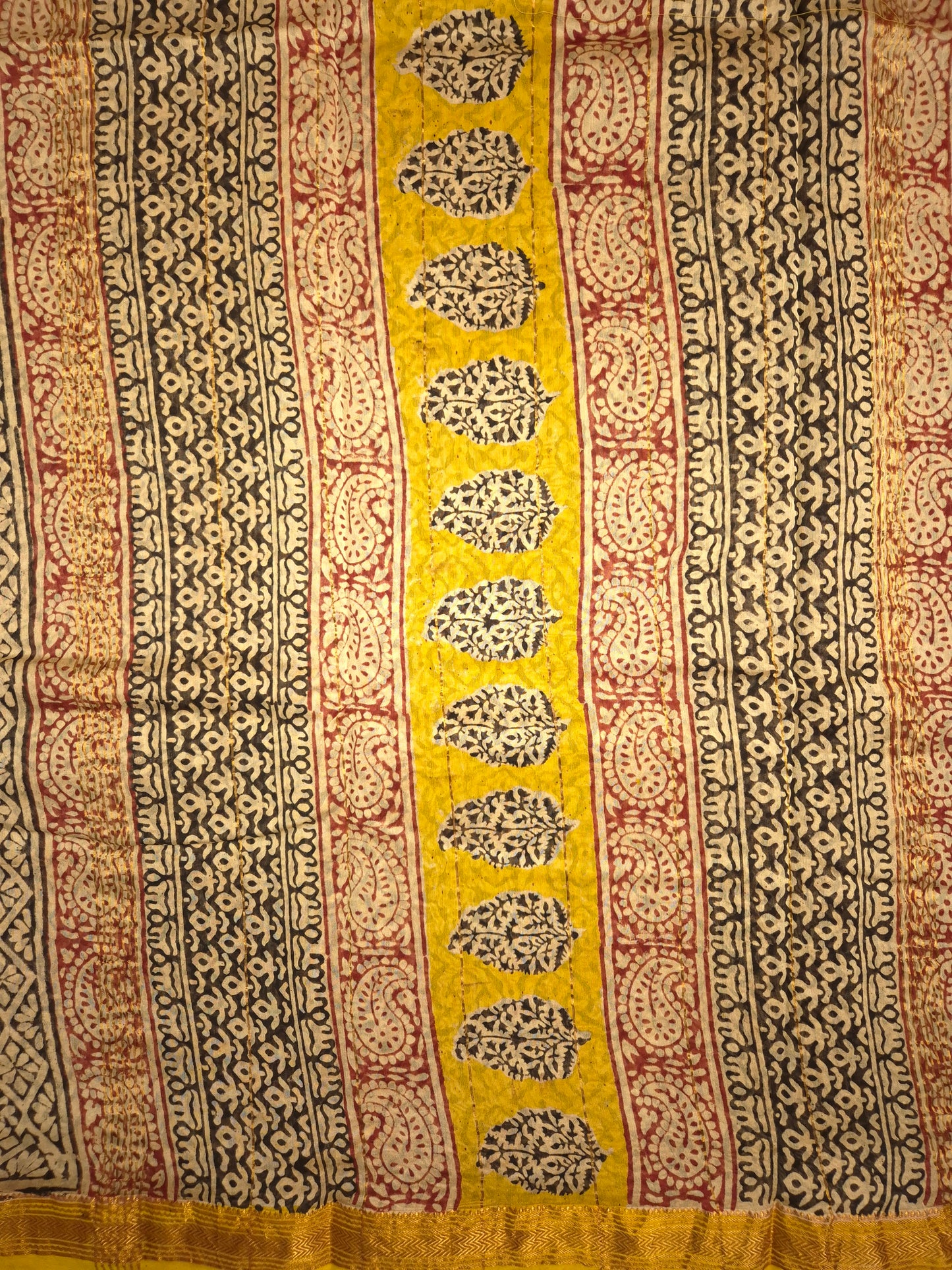 Ajrakh Printed Silk Saree with red checkered pattern allover and small intricate golden Zari Border