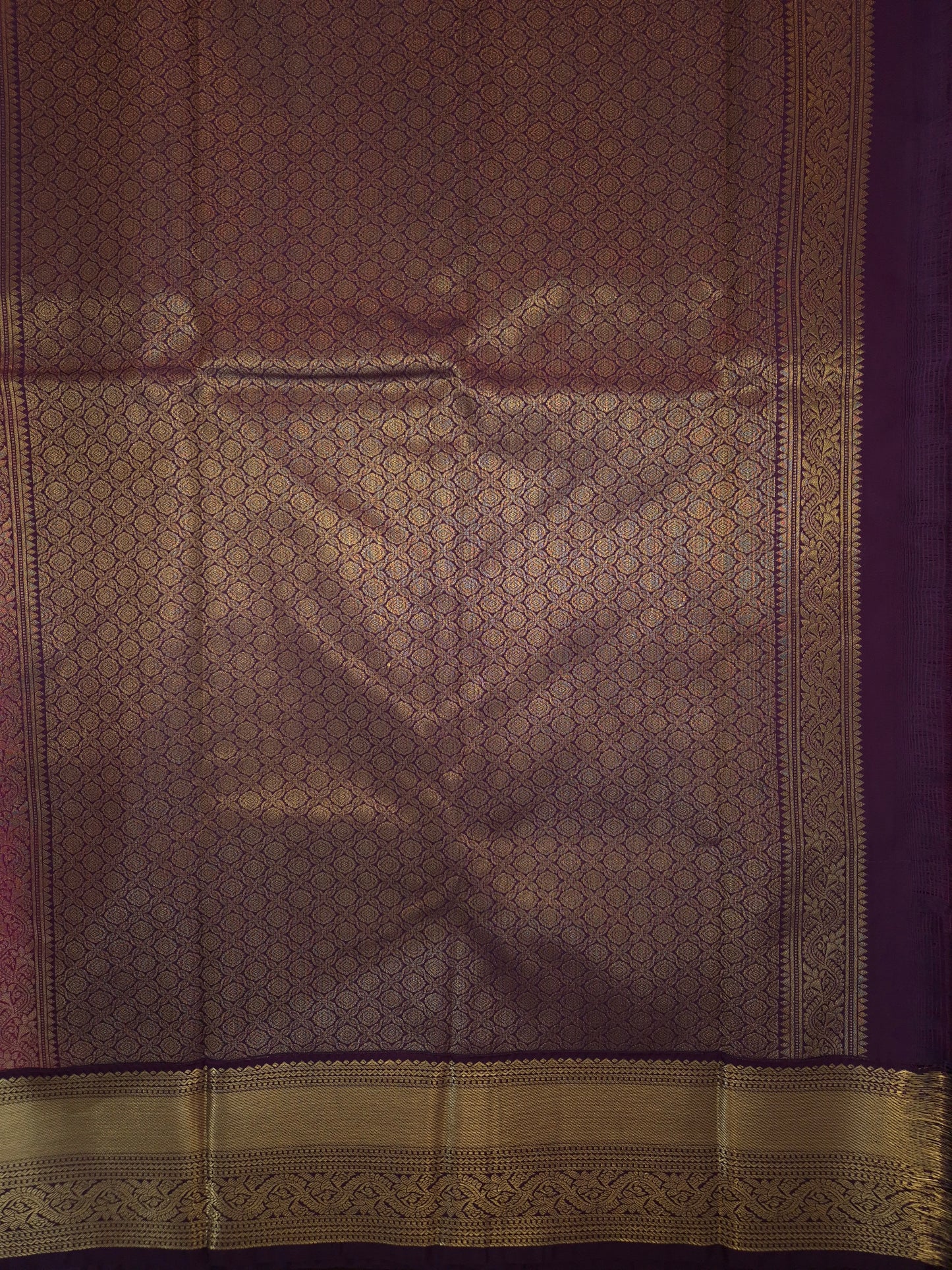 Rani Pink Kanchipuram Semi Silk Saree with fine checks and lines all over the saree with Purple Border