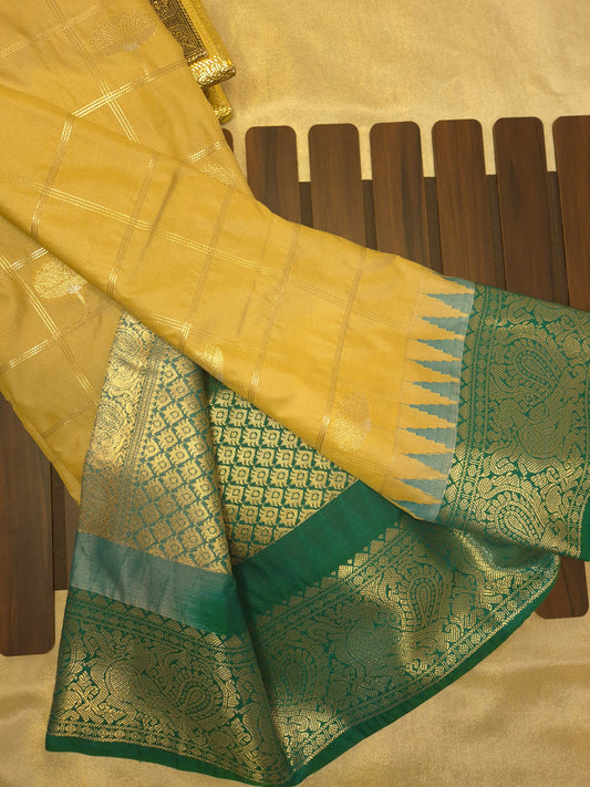 Beige Kanchipuram Semi Silk Saree with Peacock Green Border