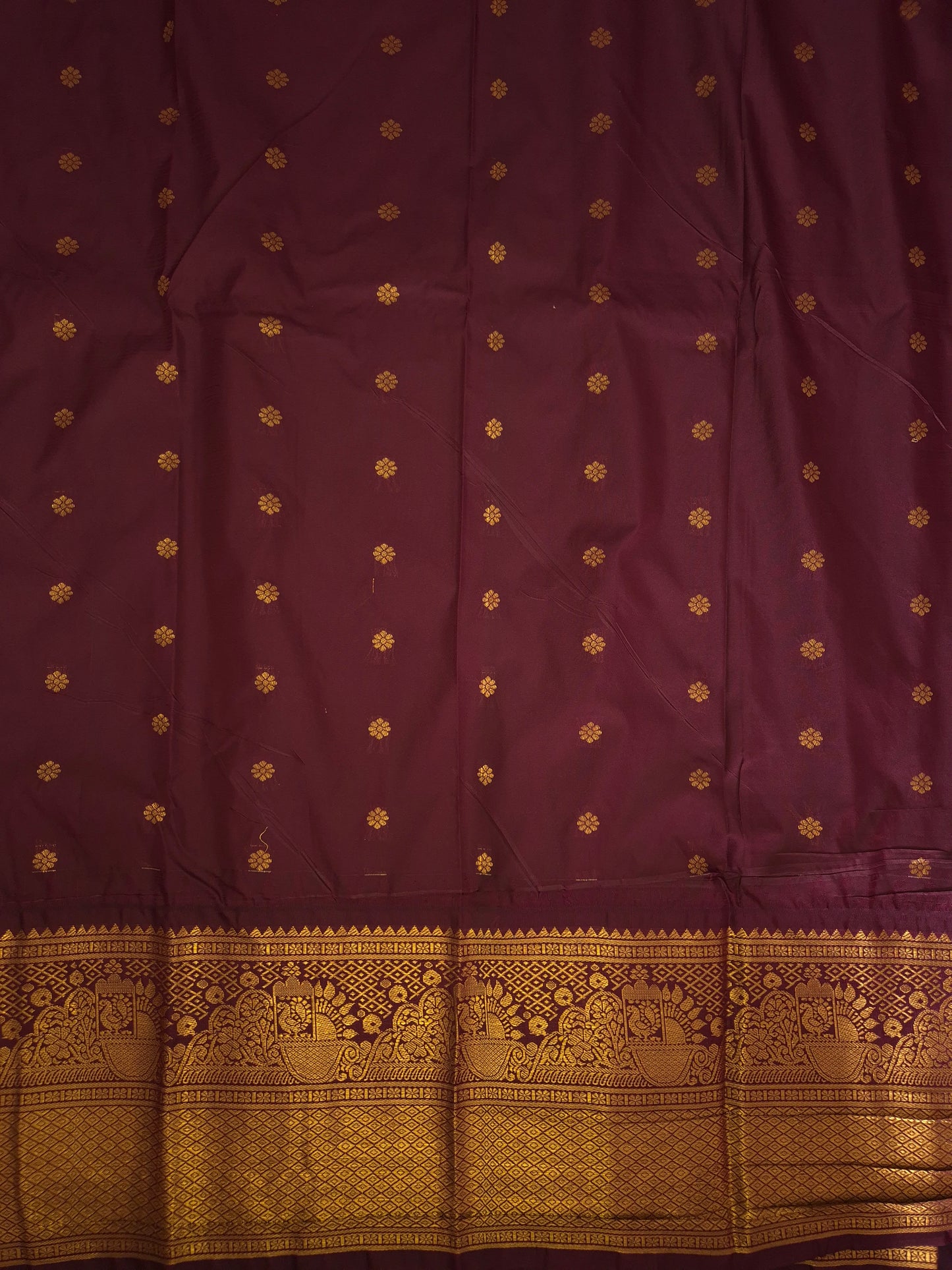 Peacock Green Gadwal Silk Saree with all-over Golden Buttas and Intricate Design on Wine Colour Border