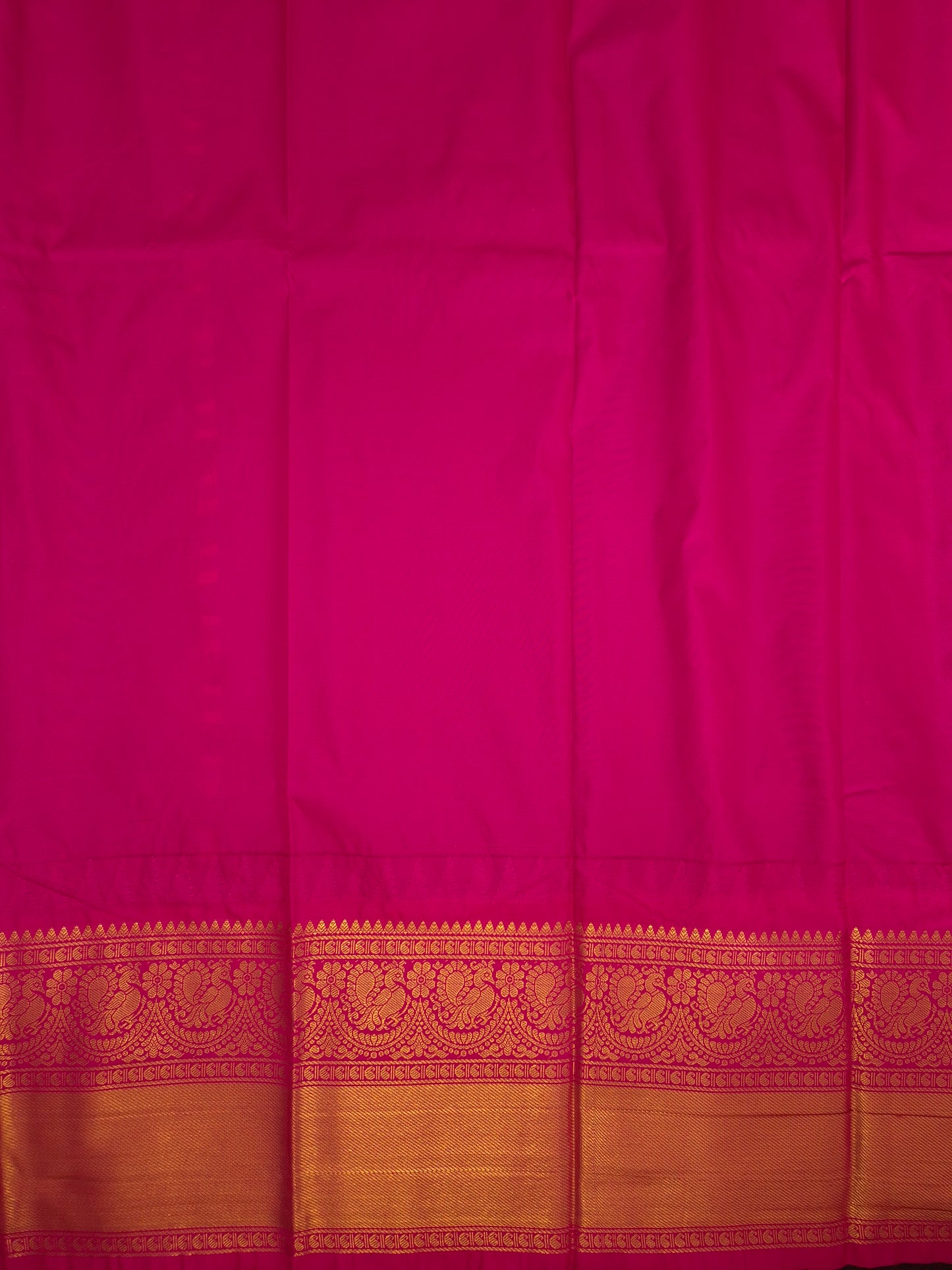 Deep Sea Green Gadwal Silk Saree with all-over Golden Buttas and Intricate Design on Rani Pink Colour Border