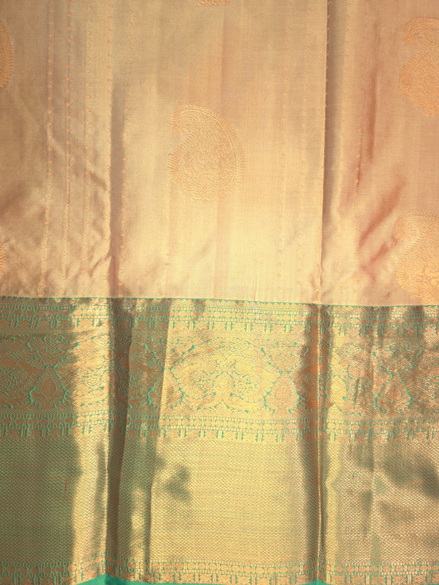 Beige Kanchipuram Silk Saree with Turquoise Border and Golden Zari