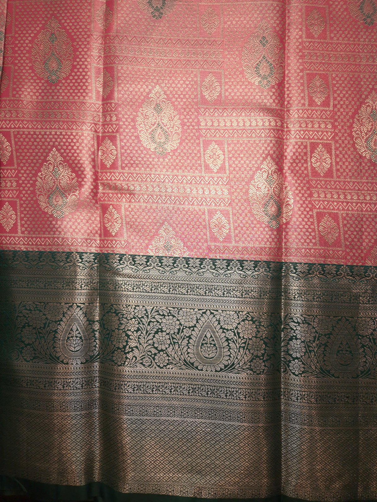 Reddish Pink Colour with Overall Intricate Silver Zari Semi Silk Saree with Bottle Green Broad Silver Zari Border