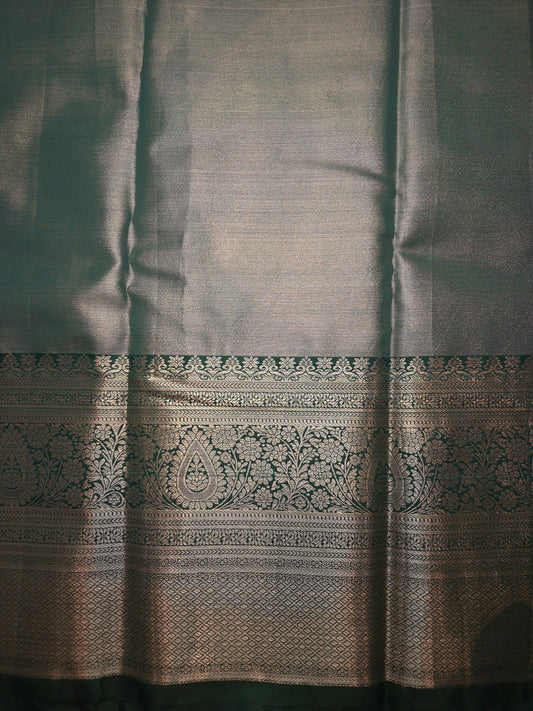 Reddish Pink Colour with Overall Intricate Silver Zari Semi Silk Saree with Bottle Green Broad Silver Zari Border
