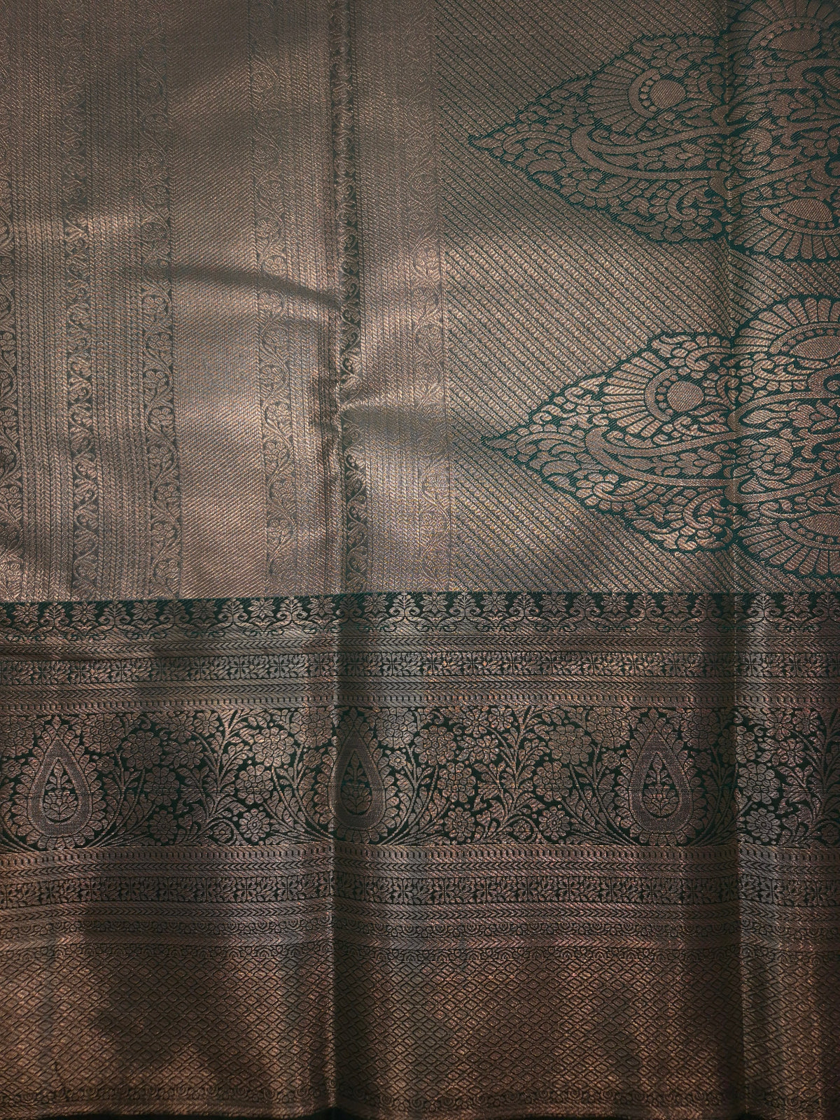 Reddish Pink Colour with Overall Intricate Silver Zari Semi Silk Saree with Bottle Green Broad Silver Zari Border