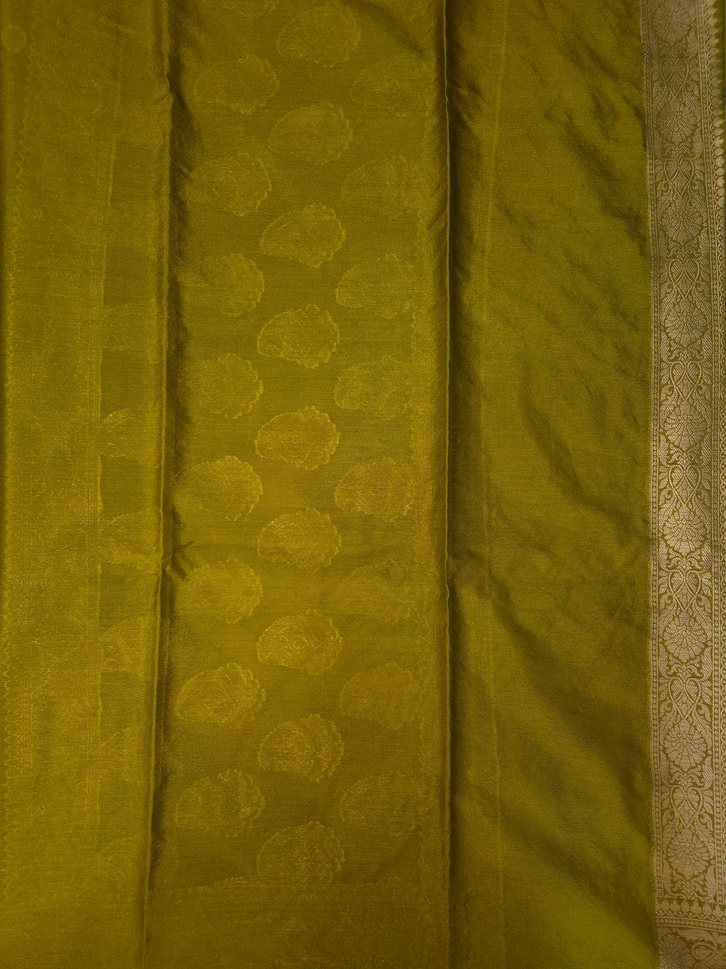 Banarasi Mehendi Green Warm Silk Saree with allover Butta Pattern and an intricate zari border