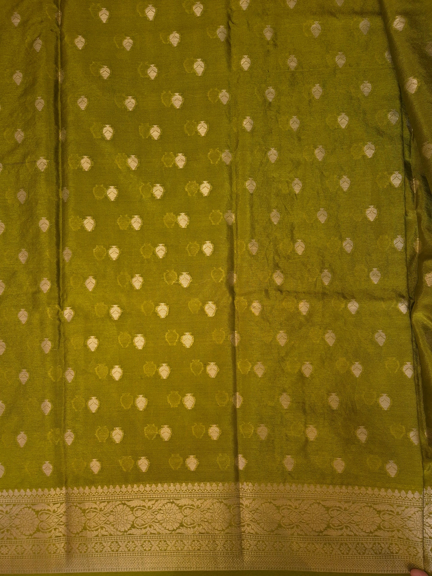 Banarasi Mehendi Green Warm Silk Saree with allover Butta Pattern and an intricate zari border