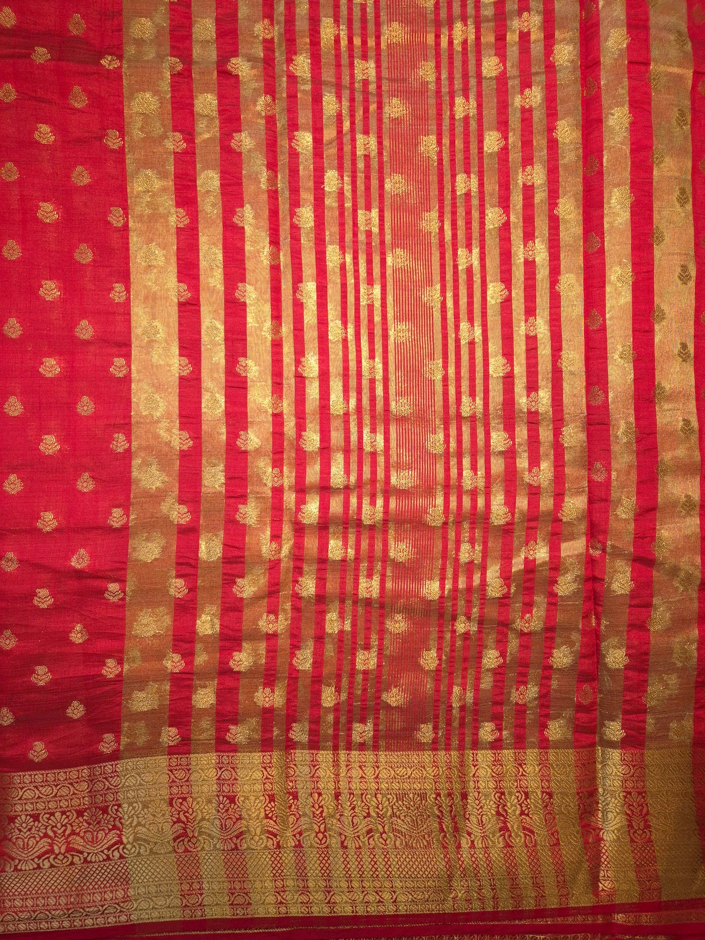 Red Raw Silk Saree with allover Golden Buttas and Zari