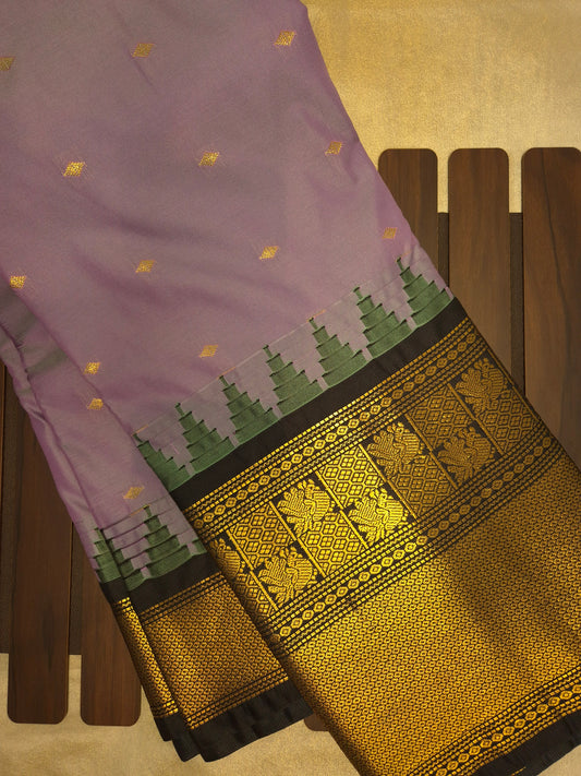 Lilac Gadwal Silk Saree with all-over Golden Buttas and Intricate Design on Black Border