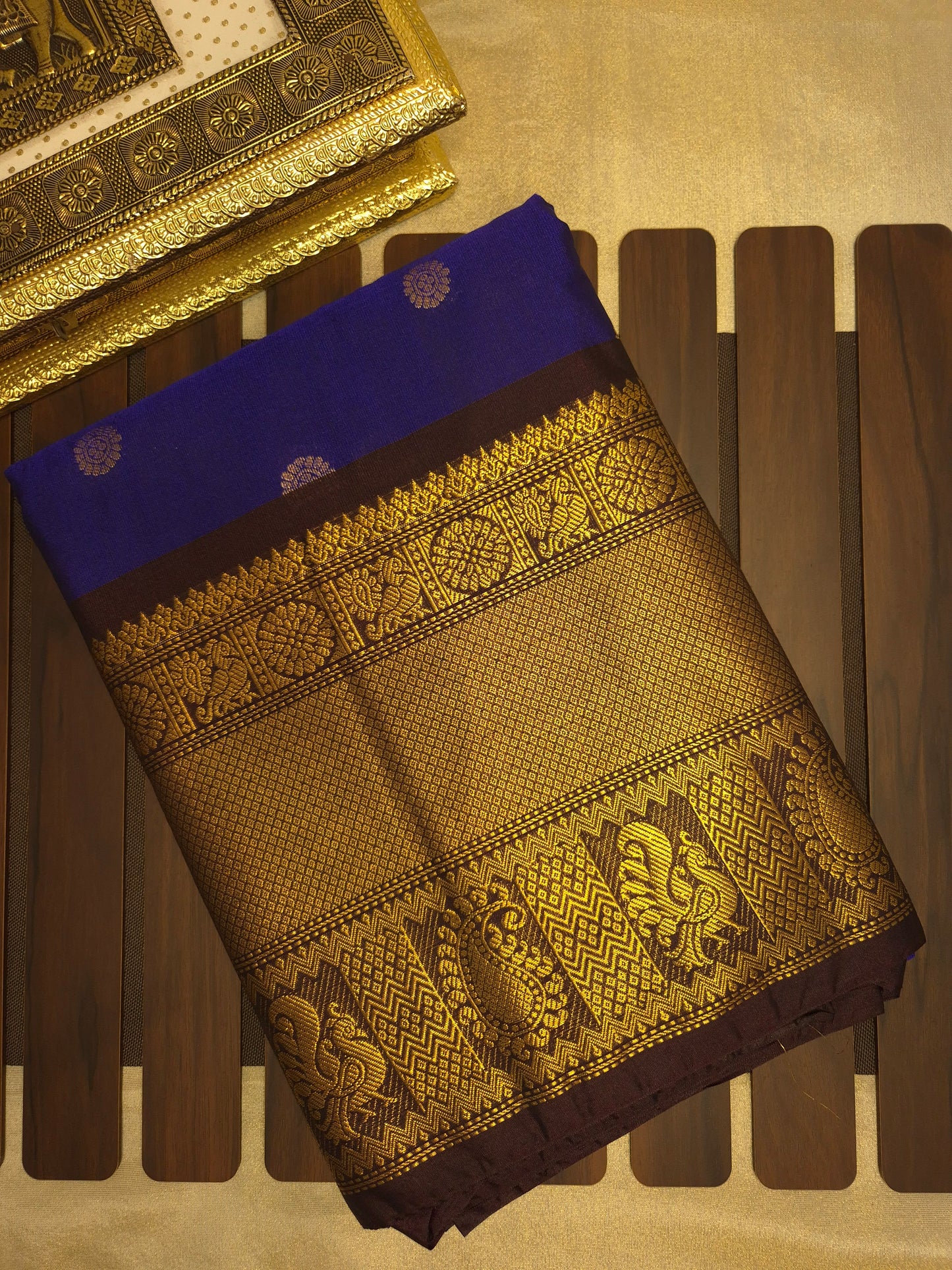 Royal Blue Gadwal Silk Saree with all-over Golden Buttas and Intricate Design on Dark Wine Border