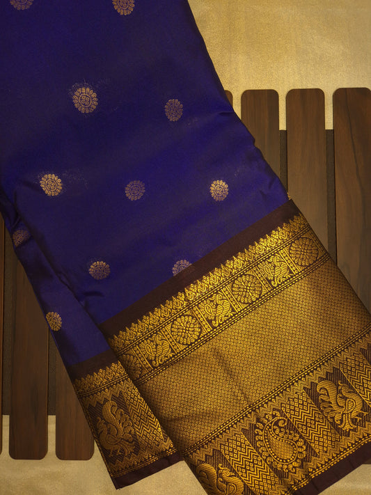 Royal Blue Gadwal Silk Saree with all-over Golden Buttas and Intricate Design on Dark Wine Border