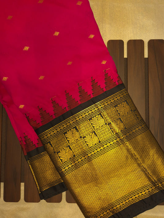 Rani Pink Gadwal Silk Saree with all-over Golden Buttas and Intricate Design on Black Border