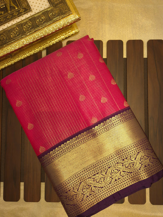 Rani Pink Kanchipuram Semi Silk Saree with fine checks and lines all over the saree with Purple Border