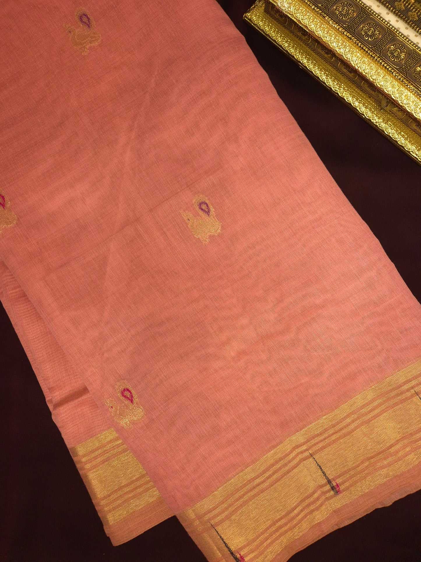 Pastel Pink Jamdani Saree with Golden Zari Peacock Buttas and Colorful Peacock Motifs on Pallu