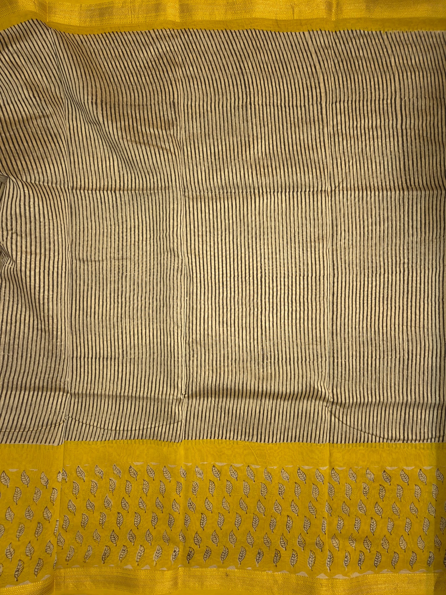 Ajrakh Printed Silk Saree with Striped Pattern and broad Yellow leaves print with Golden Zari Border