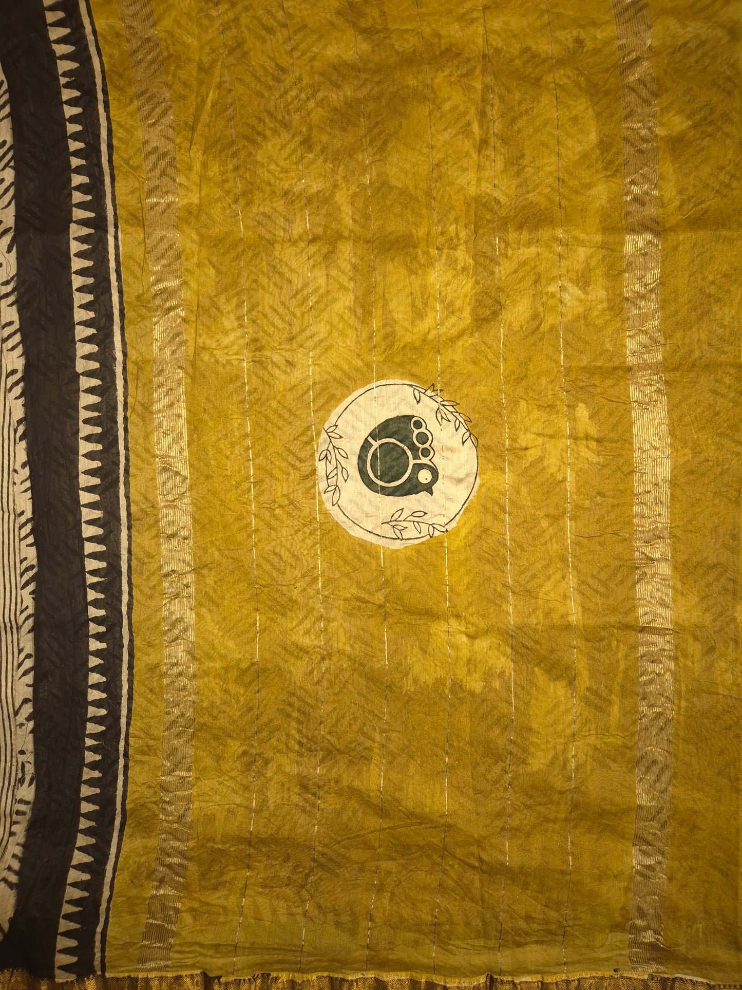 Ajrakh Printed Silk Saree with striped pattern and small intricate temple golden Zari Border