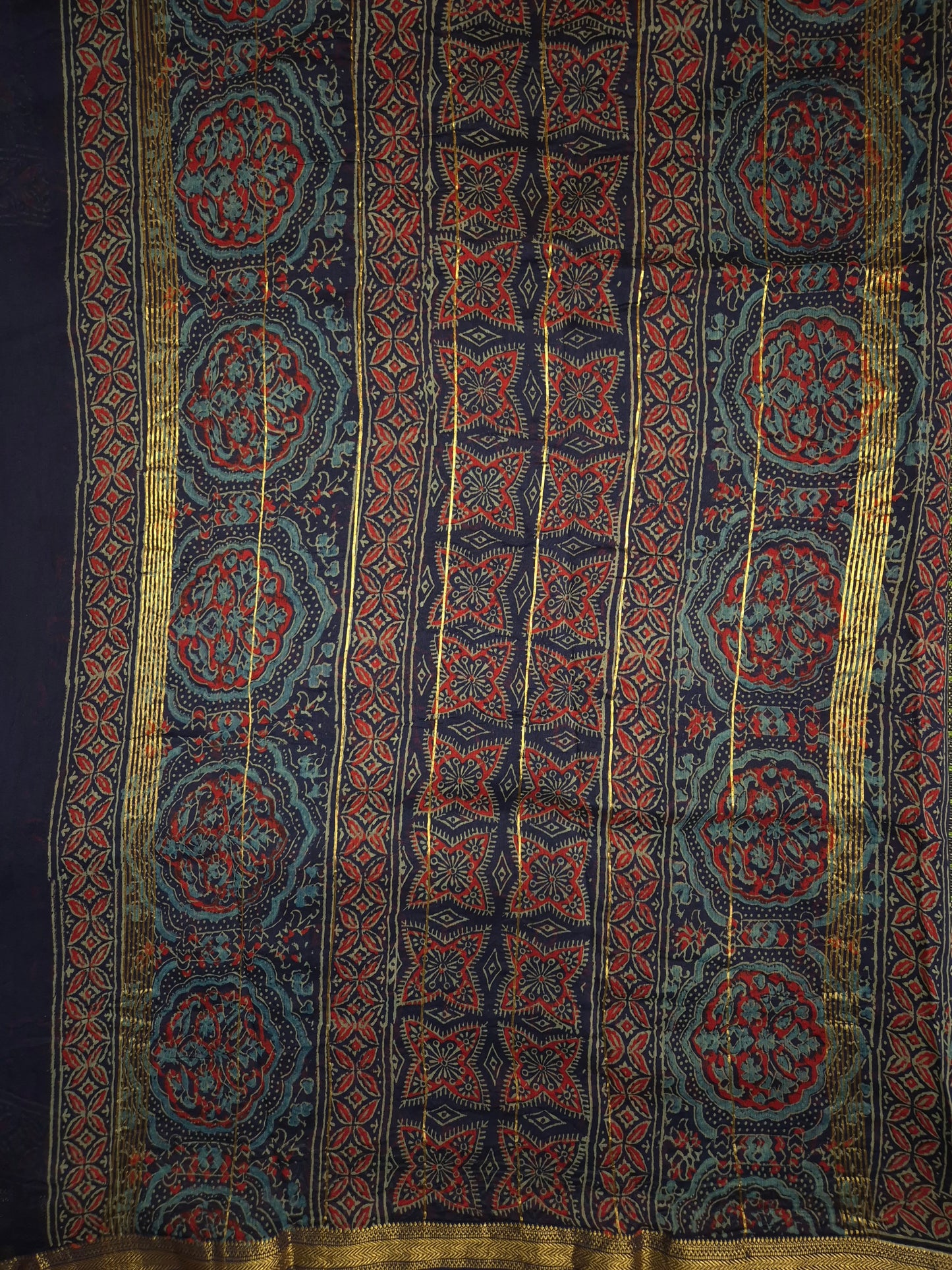 Navy Blue Ajrakh Printed Silk Saree with Intricate Floral Broad Border with Golden Zari