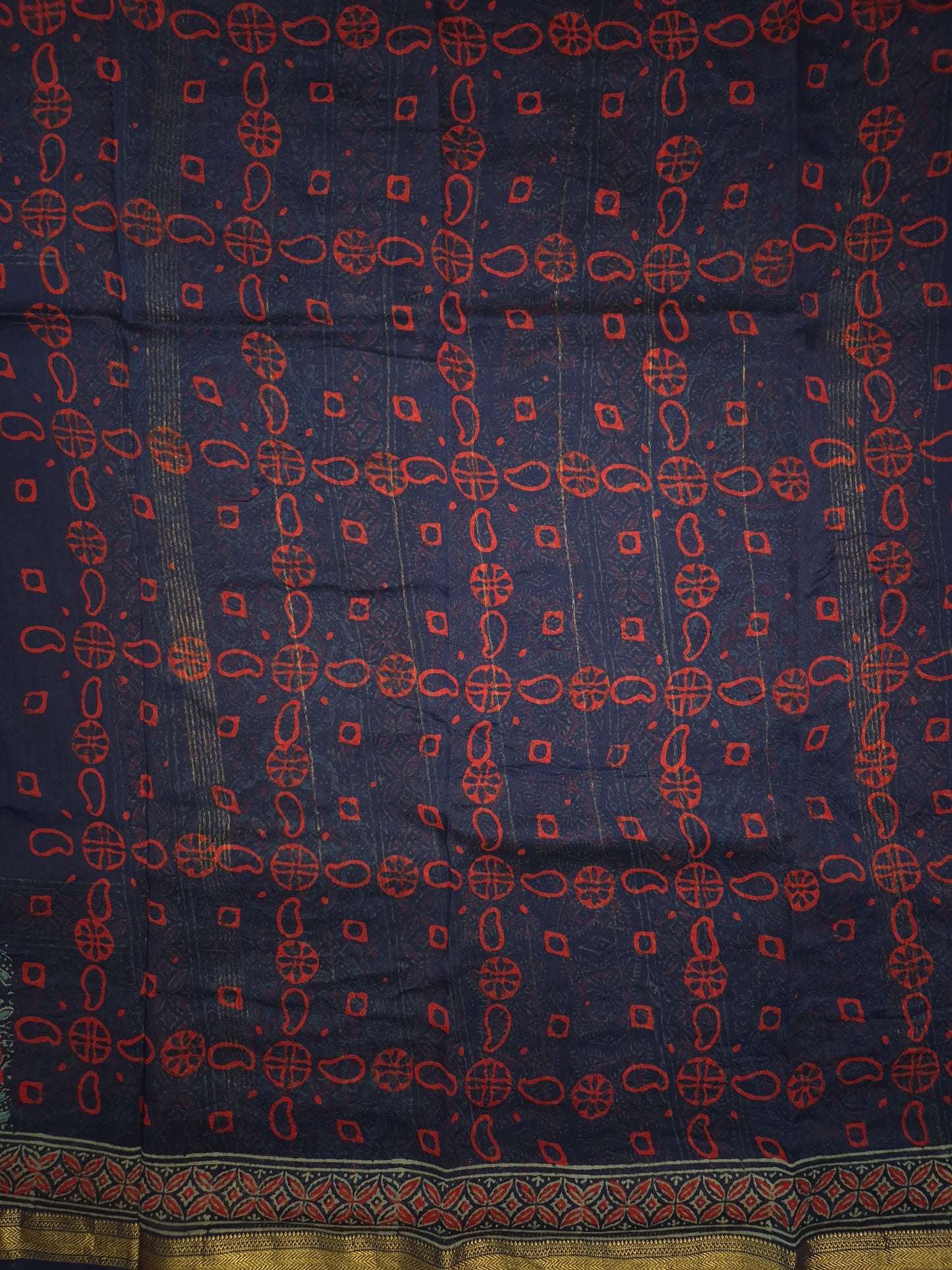 Navy Blue Ajrakh Printed Silk Saree with Intricate Floral Broad Border with Golden Zari