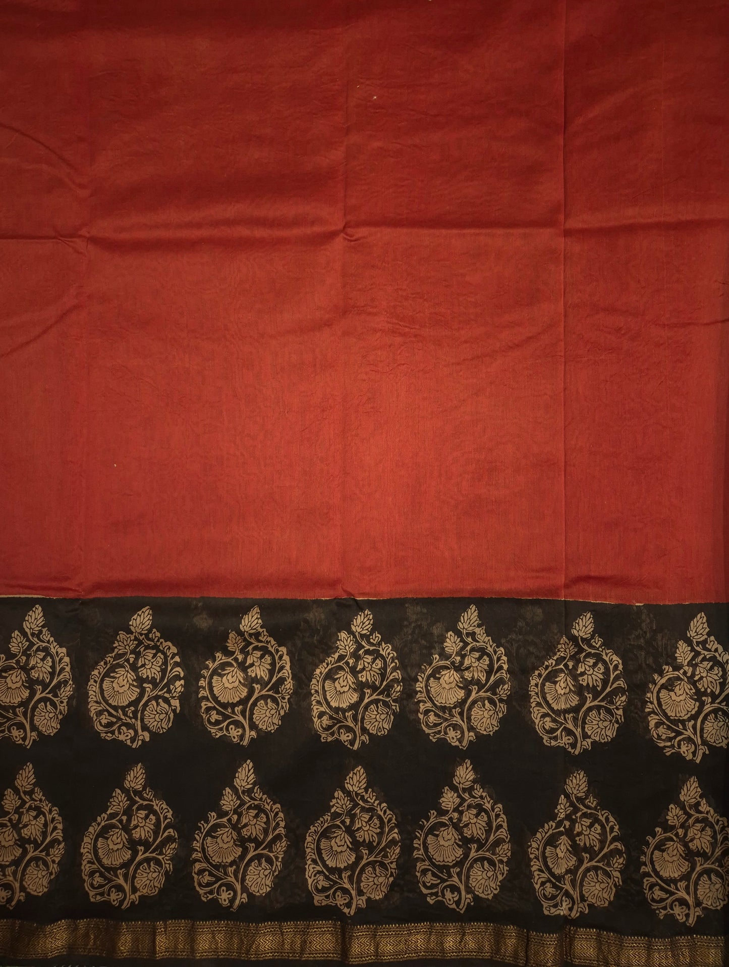 Rust Orange Ajrakh Printed Silk Saree with Intricate Design on Broad Black Border and Golden Zari