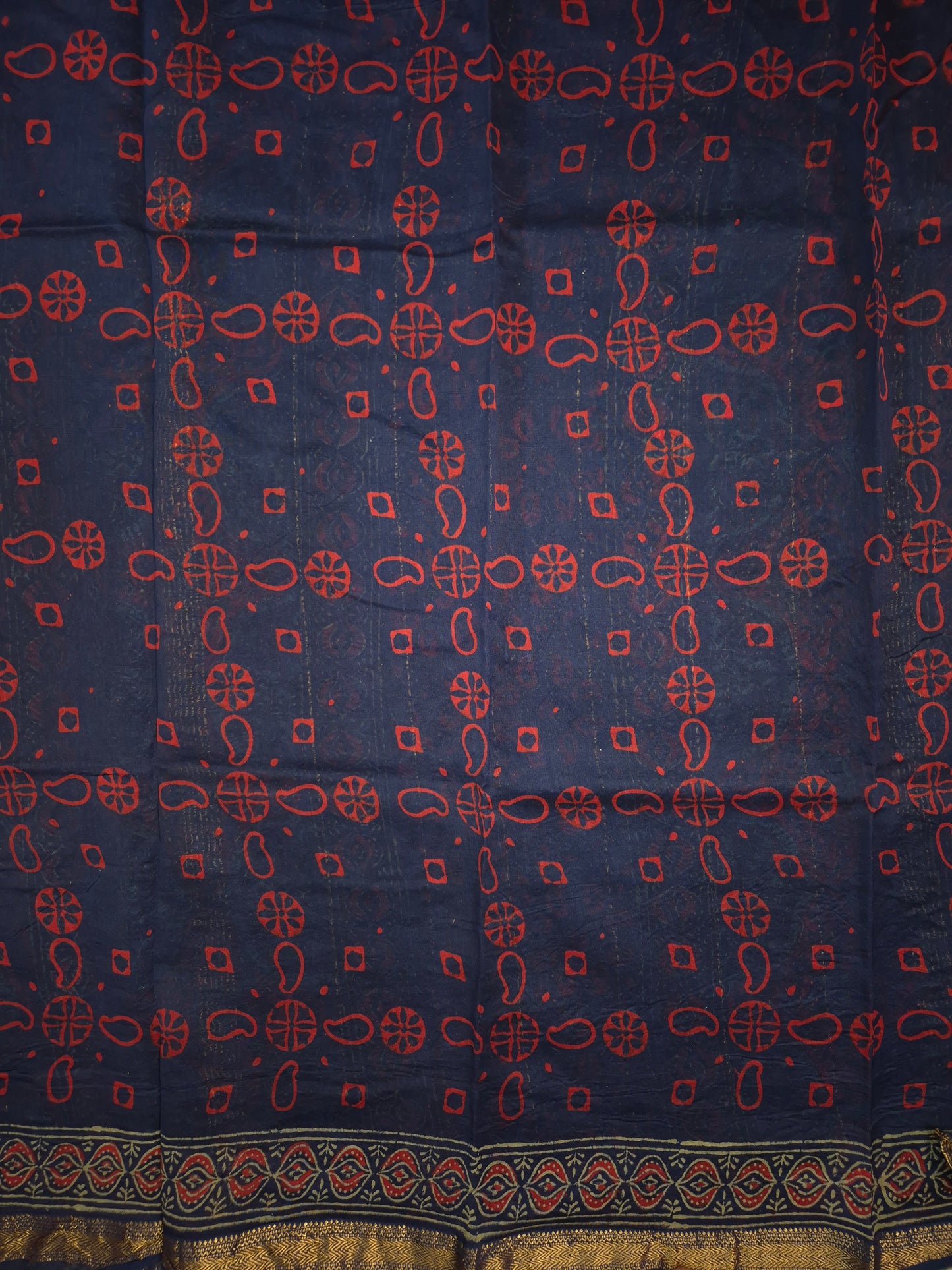 Navy Blue Ajrakh Printed Silk Saree with all-over Intricate Design with Golden Zari