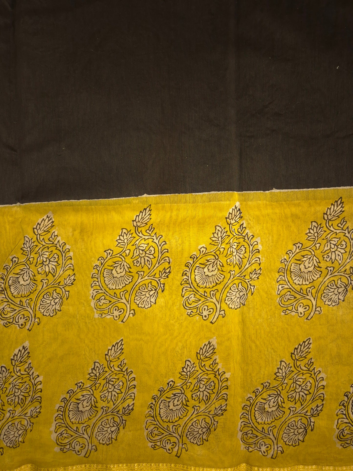 Black Ajrakh Printed Silk Saree with Intricate Design on Broad Yellow Border and Golden Zari