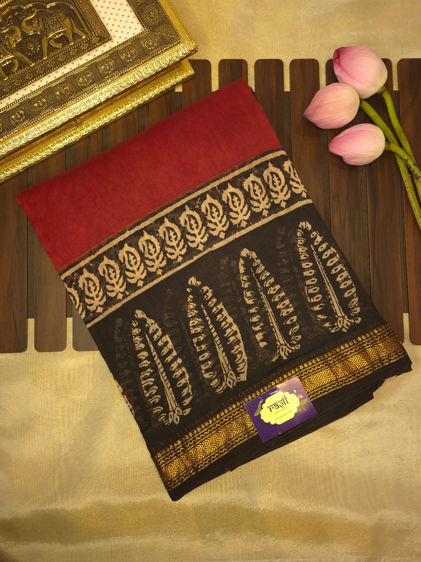 Rust Orange Ajrakh Printed Silk Saree with Intricate Leaf Motifs on Broad Black Border and Golden Zari