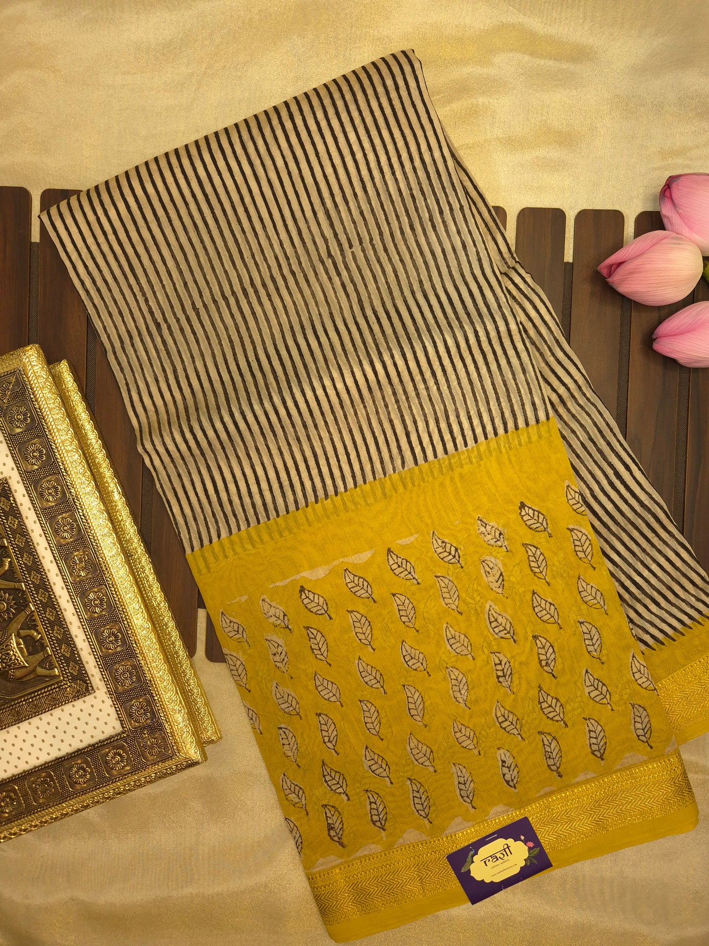 Ajrakh Printed Silk Saree with Striped Pattern and broad Yellow leaves print with Golden Zari Border