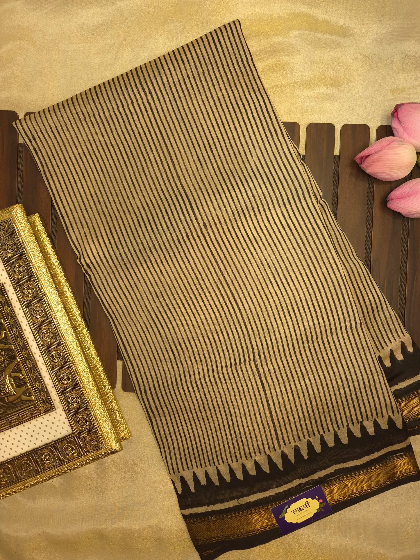 Ajrakh Printed Silk Saree with striped pattern and small intricate temple golden Zari Border