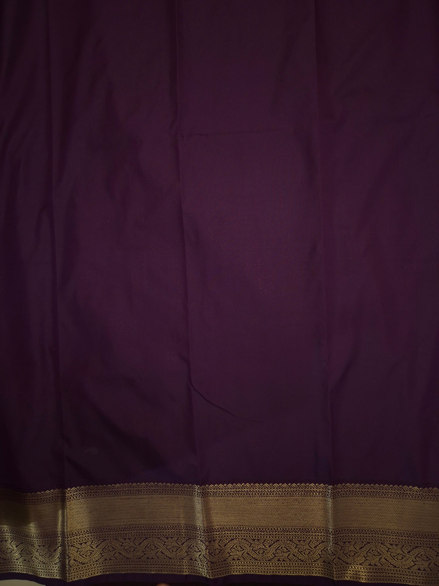 Rani Pink Kanchipuram Semi Silk Saree with fine checks and lines all over the saree with Purple Border
