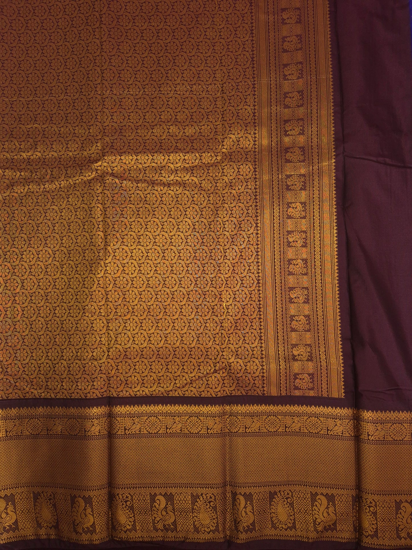 Royal Blue Gadwal Silk Saree with all-over Golden Buttas and Intricate Design on Dark Wine Border