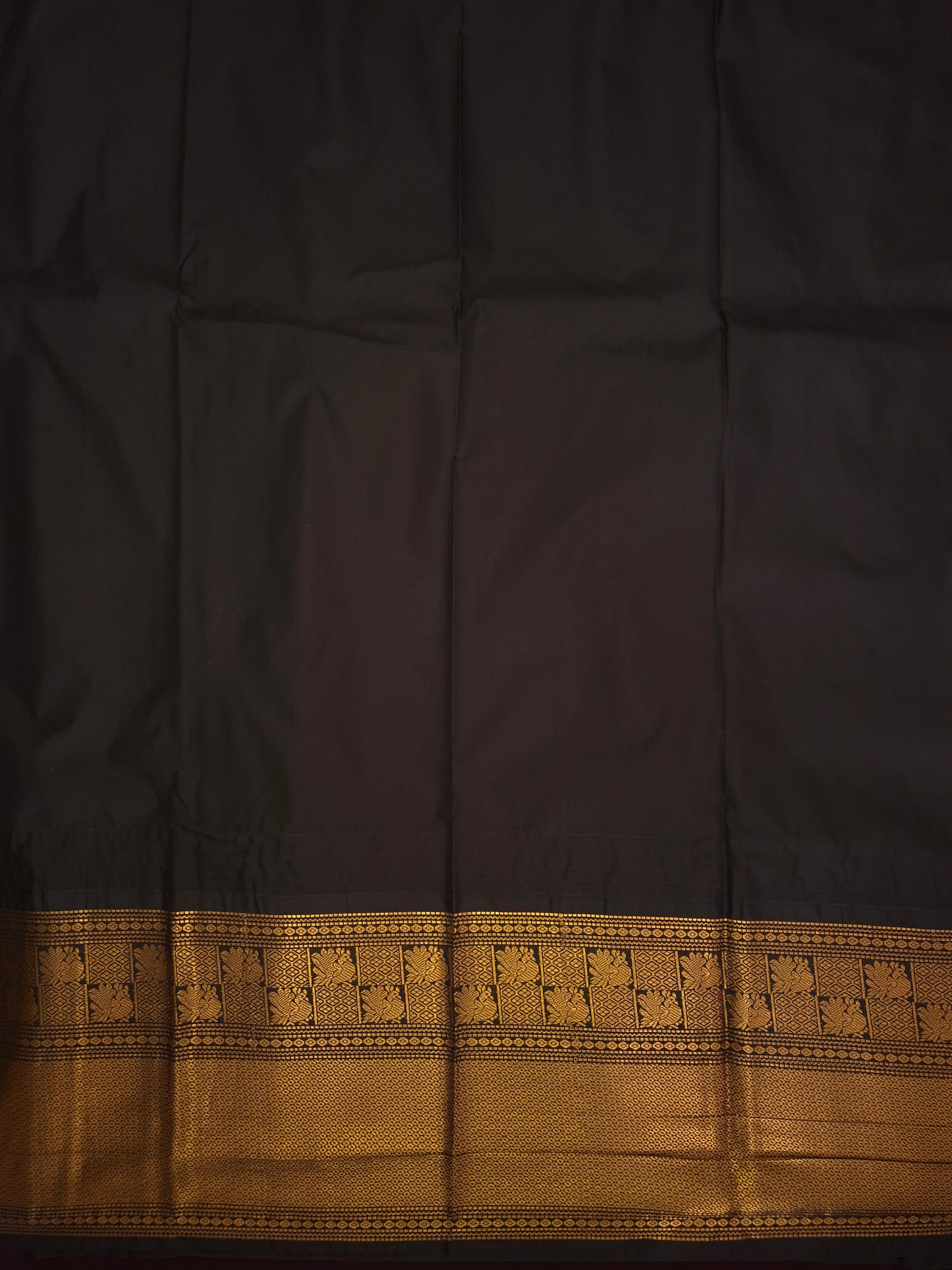 Lilac Gadwal Silk Saree with all-over Golden Buttas and Intricate Design on Black Border