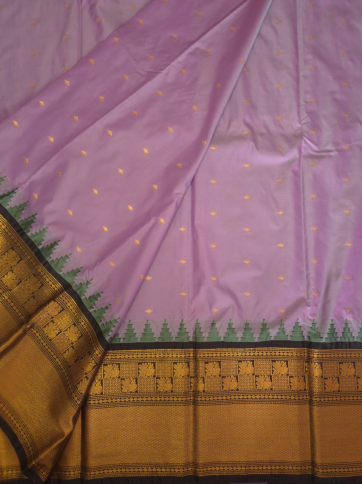 Lilac Gadwal Silk Saree with all-over Golden Buttas and Intricate Design on Black Border
