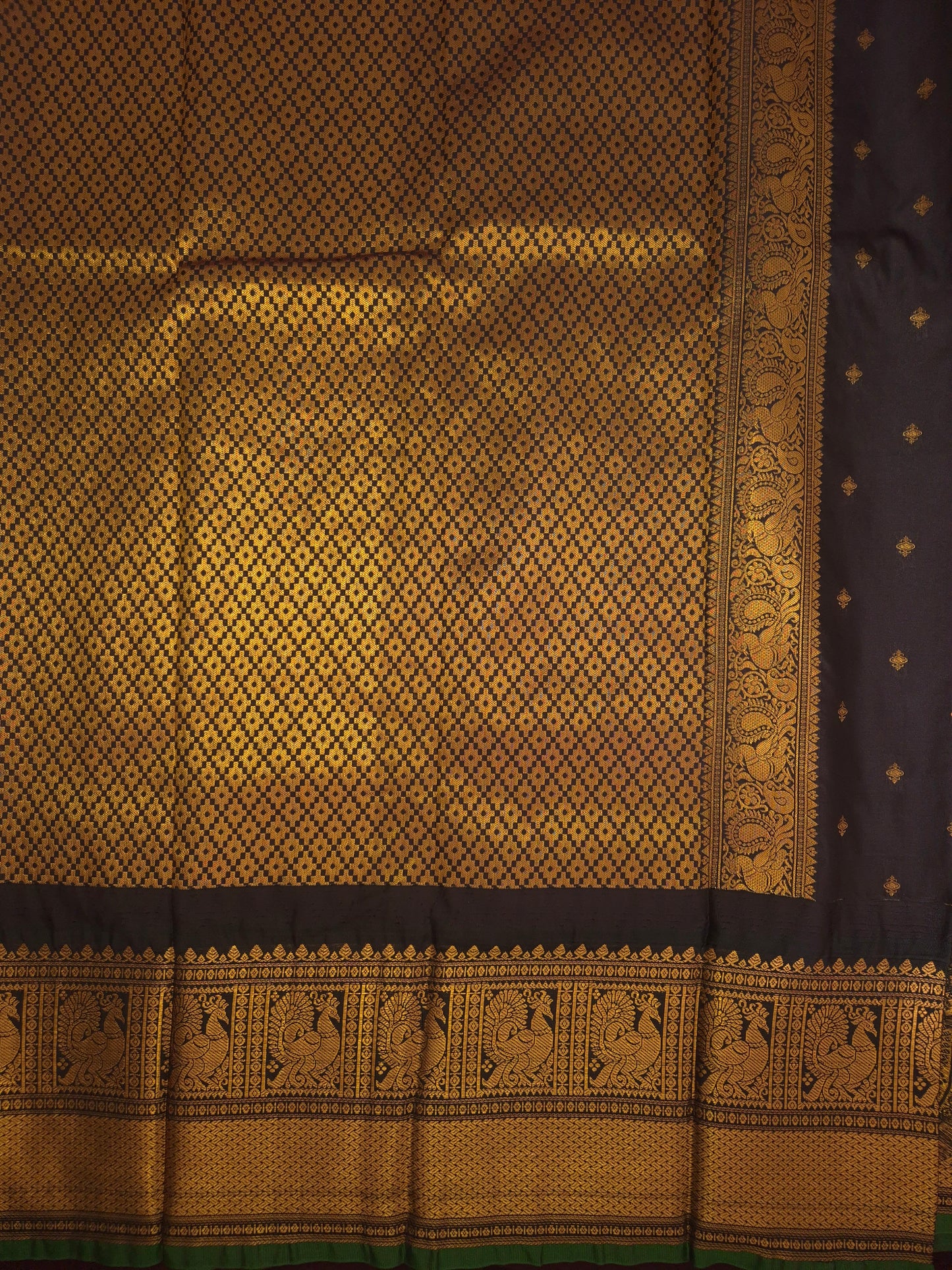 Magenta Pink Gadwal Silk Saree with all-over Golden Buttas and Intricate Design on Black Border