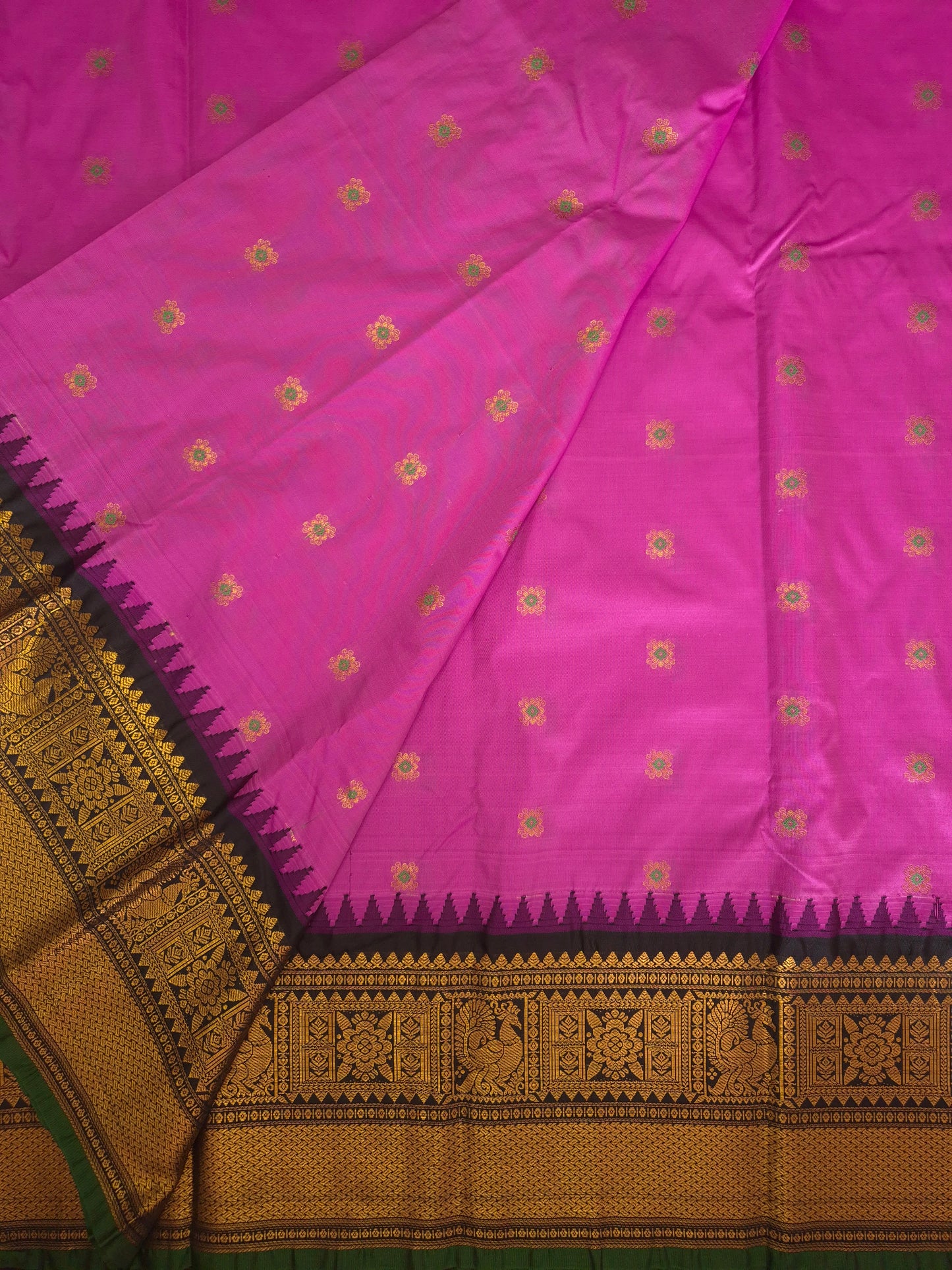Magenta Pink Gadwal Silk Saree with all-over Golden Buttas and Intricate Design on Black Border