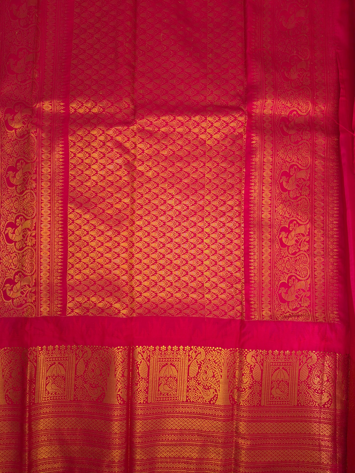 Turquoise Blue Gadwal Silk Saree with all-over Golden Buttas and Intricate Design on Red Border