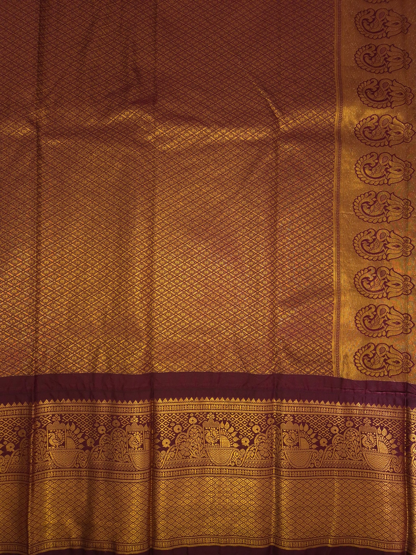 Peacock Green Gadwal Silk Saree with all-over Golden Buttas and Intricate Design on Wine Colour Border