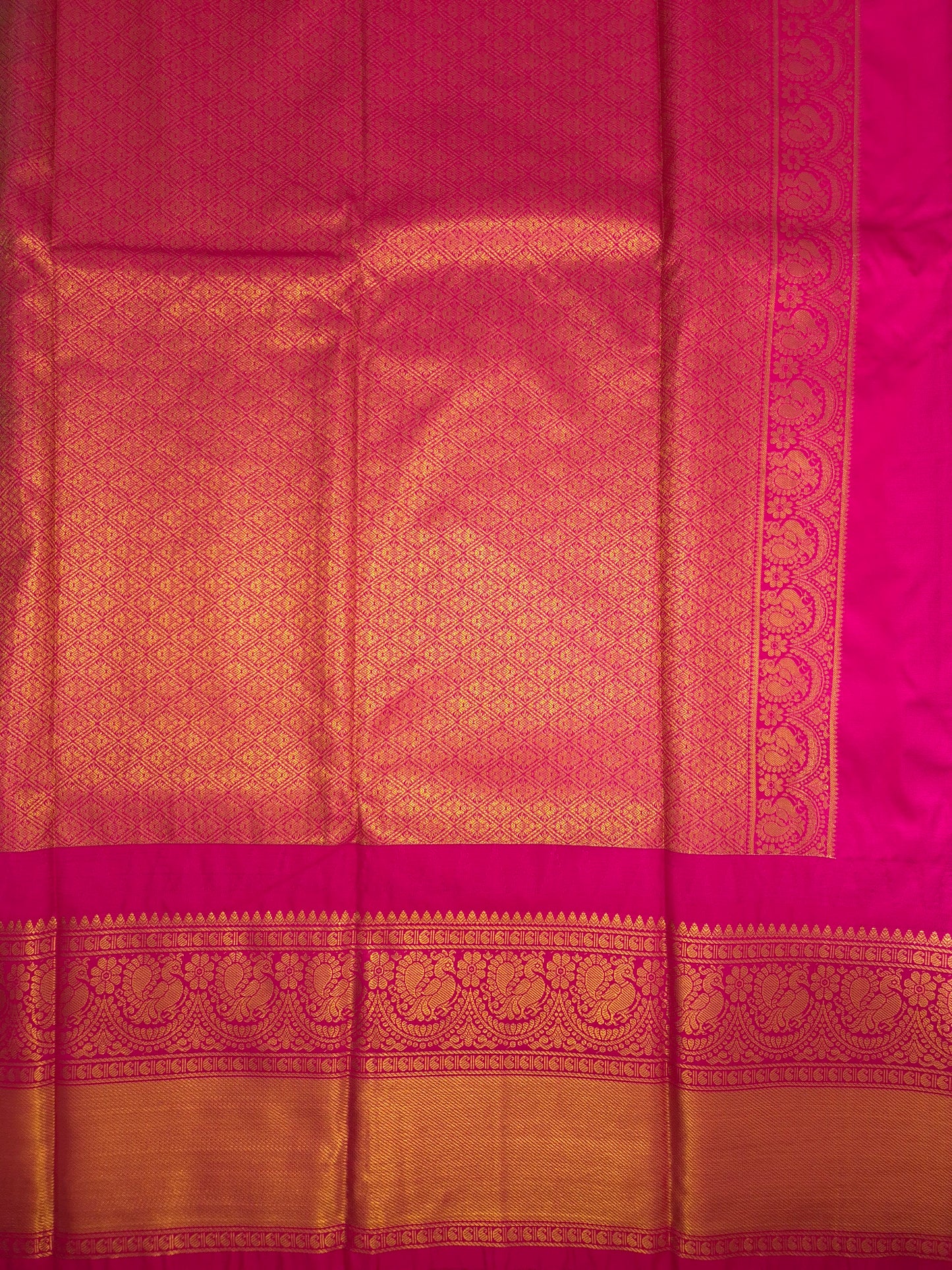 Deep Sea Green Gadwal Silk Saree with all-over Golden Buttas and Intricate Design on Rani Pink Colour Border
