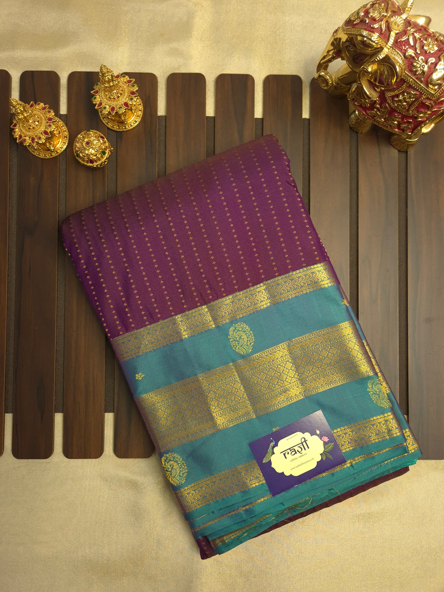Purple Kanchipuram Silk Saree with Teal Border and Golden Zari