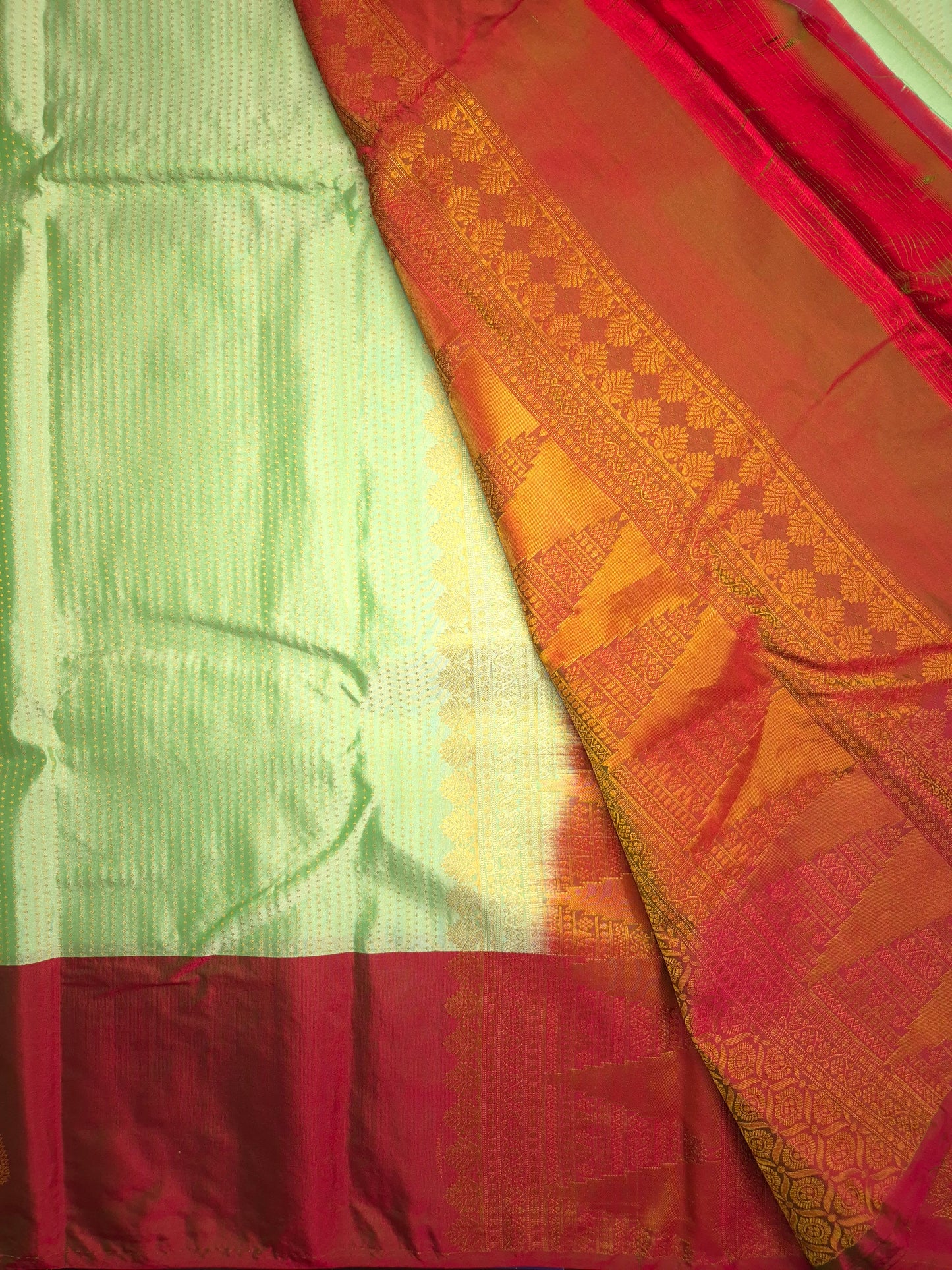 Light Mint Green Kanchipuram Silk Saree with Red Border and Golden Zari