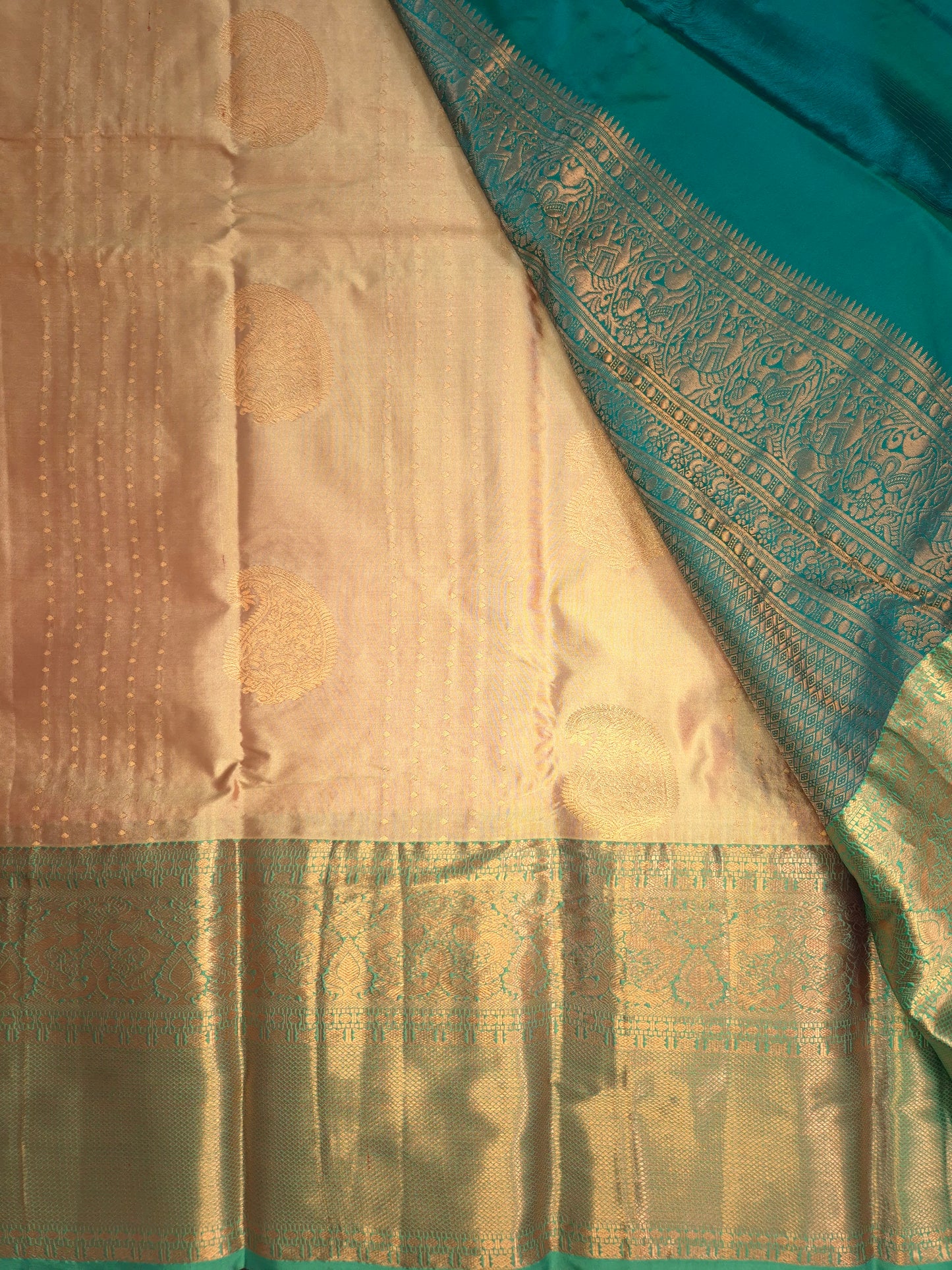 Beige Kanchipuram Silk Saree with Turquoise Border and Golden Zari