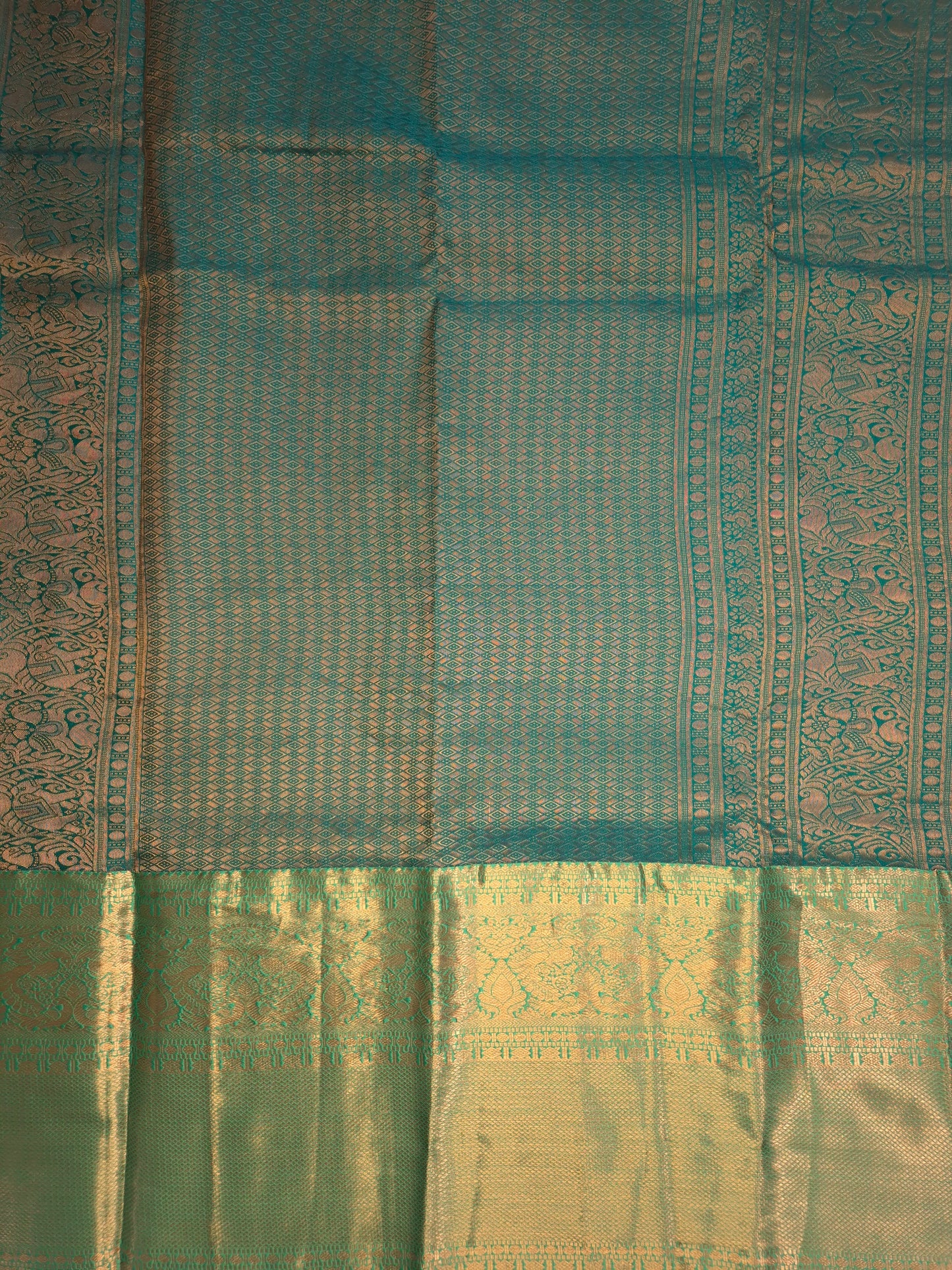 Beige Kanchipuram Silk Saree with Turquoise Border and Golden Zari