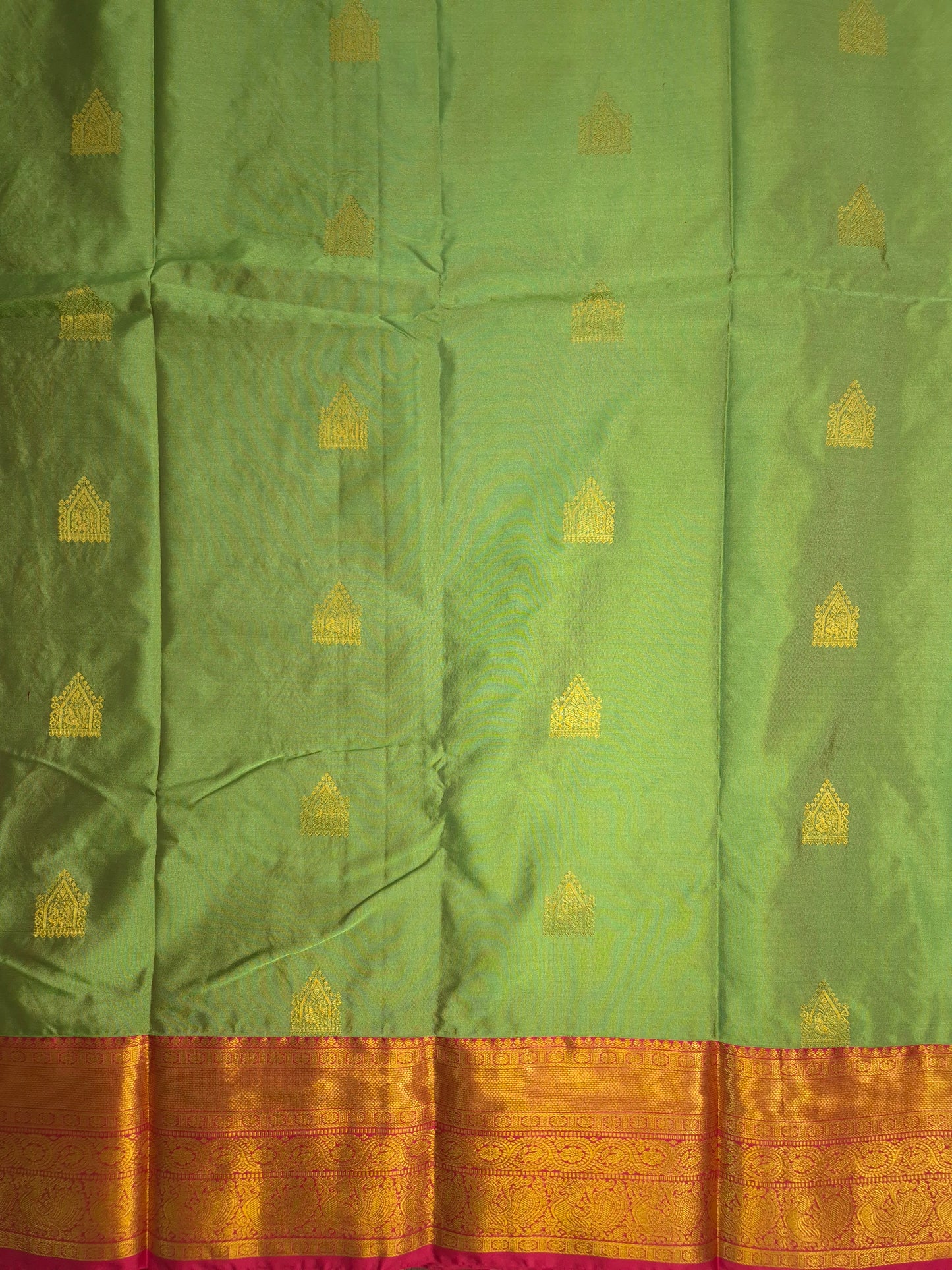 Light Green Kanchipuram Silk Saree with Rani Pink Border and Golden Zari