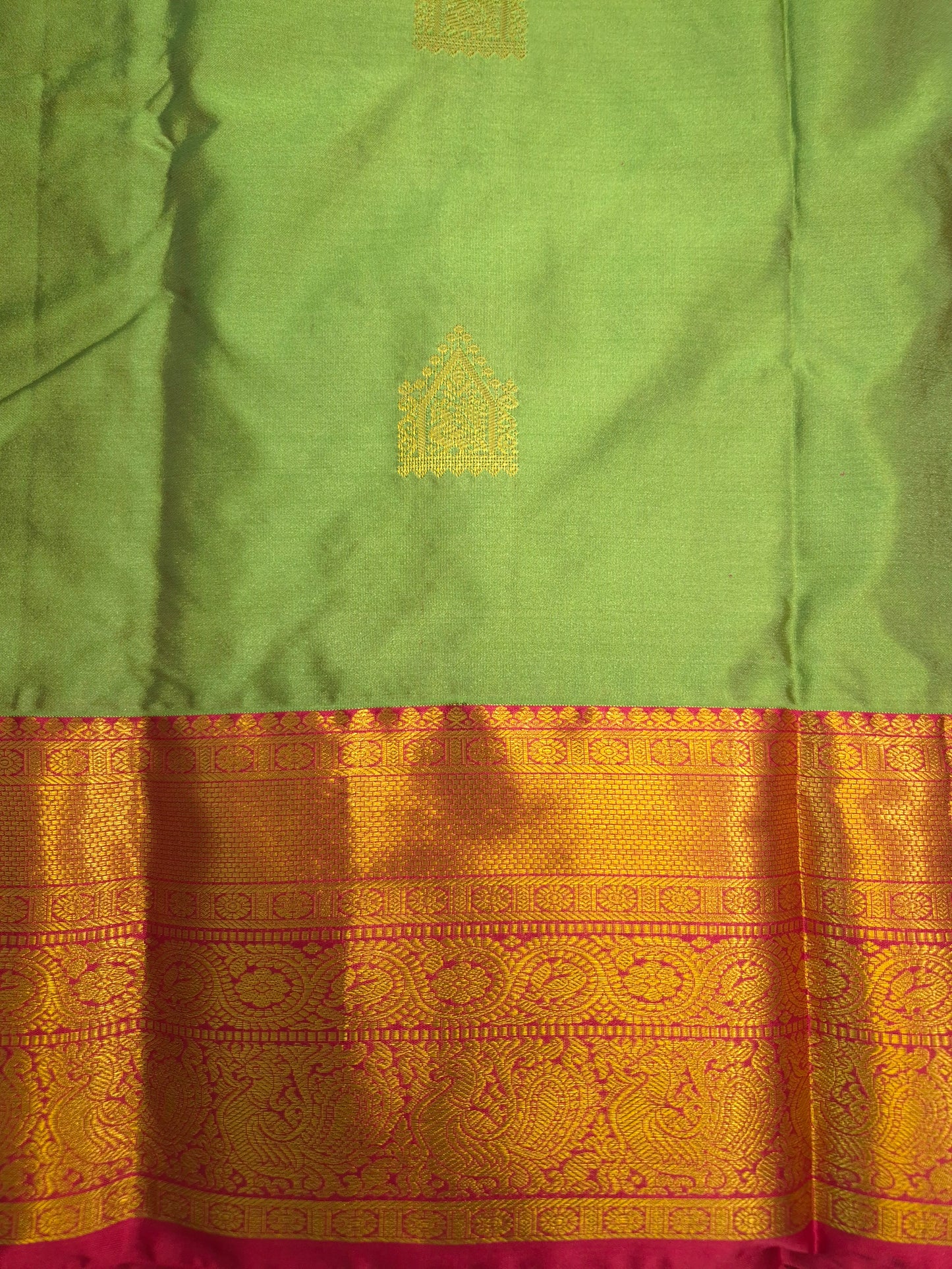 Light Green Kanchipuram Silk Saree with Rani Pink Border and Golden Zari